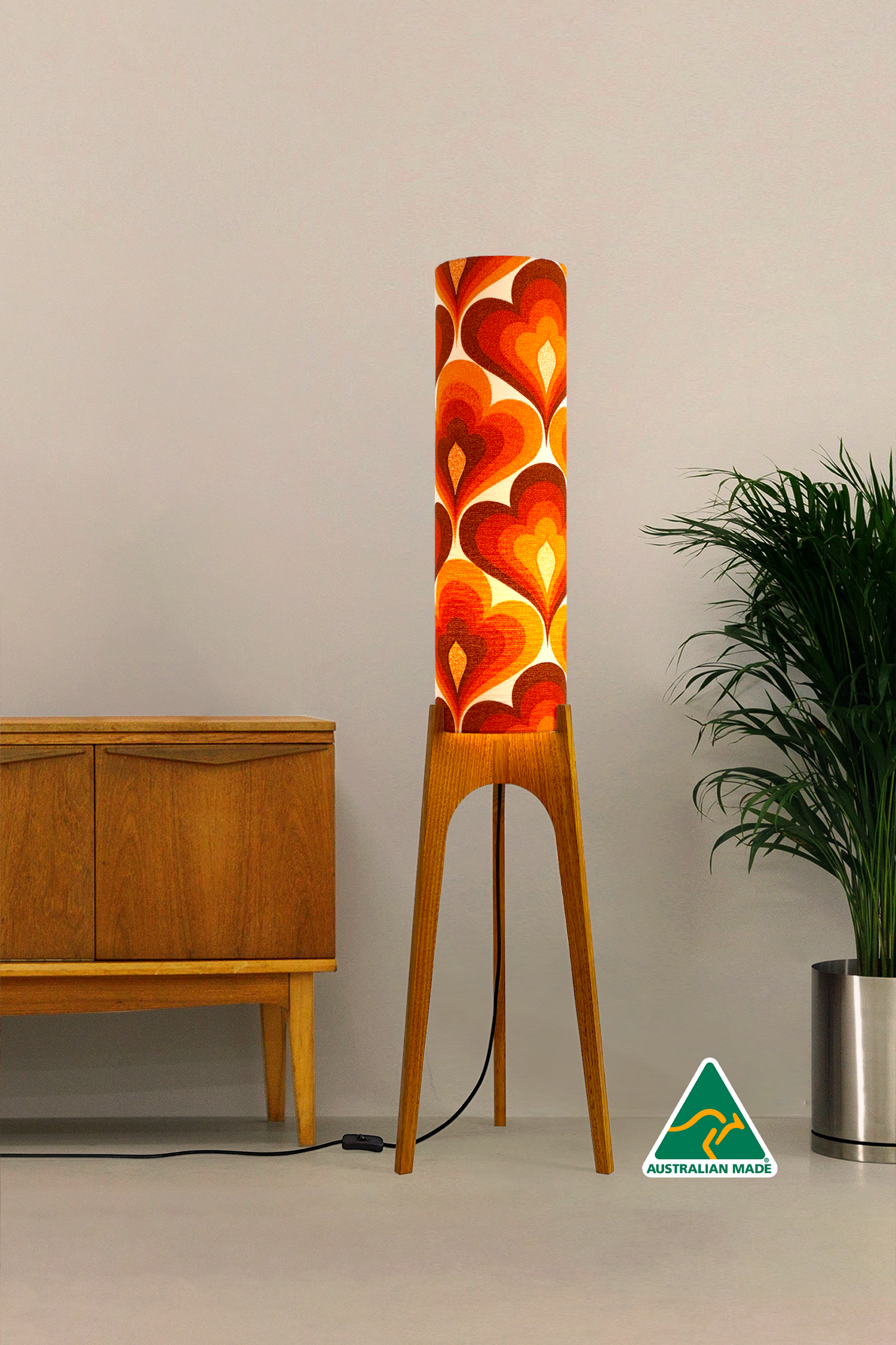 70s Love - Archie Rocket floor lamp with a vibrant orange and red heart-patterned shade made with authentic vintage fabric