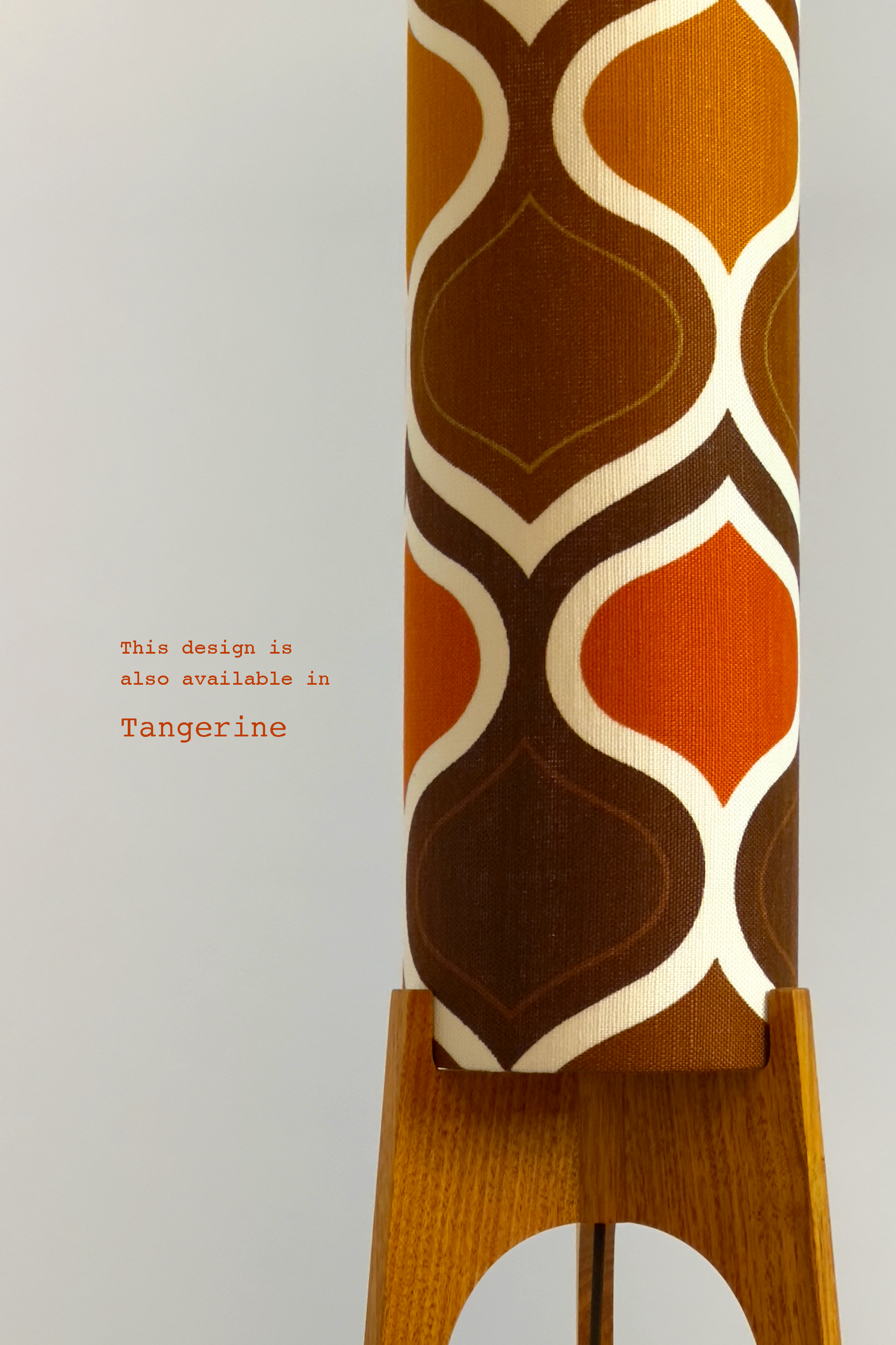 The Tangerine Archie Rocket Floor Lamp is a playful nod to the geometric patterns of the 1970s. Handcrafted from authentic vintage fabric and hardwood oak.