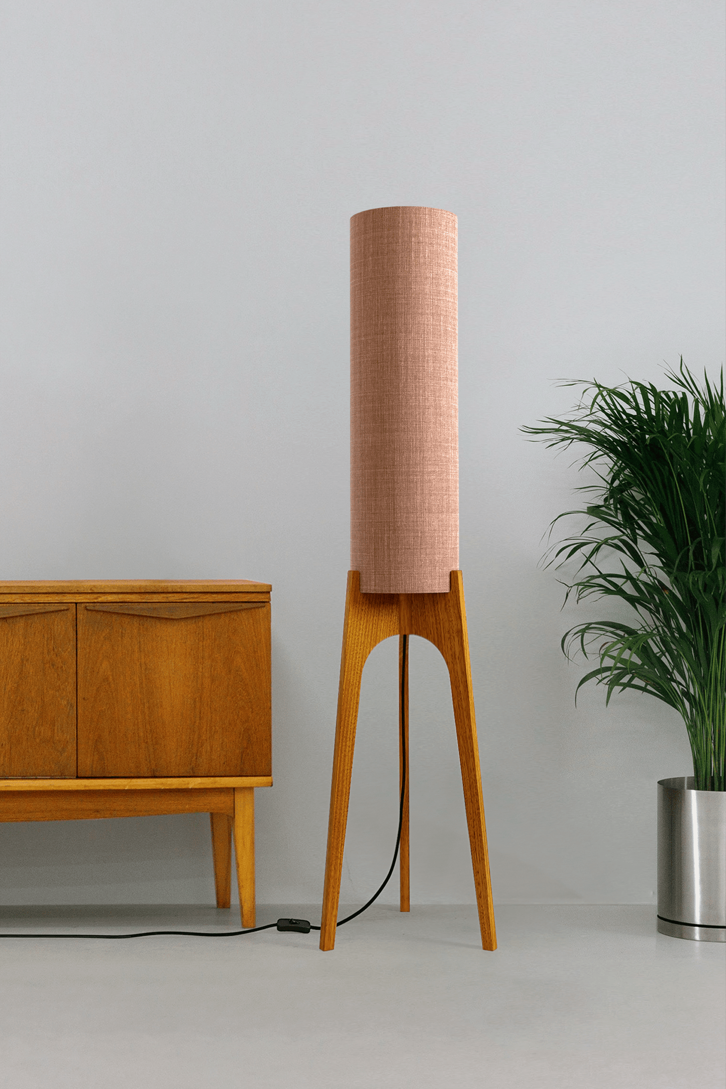 Blush Archie Rocket Wooden floor lamp with a cylindrical shade on a neutral background