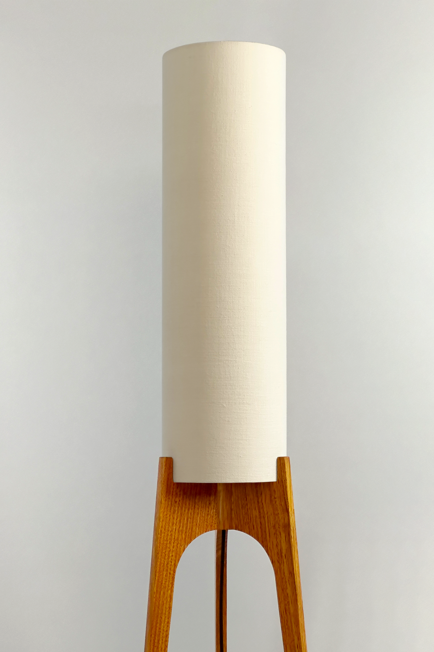 Cotton – Premium Linen Archie Rocket Floor Lamp with a beige shade and wooden base. Clean, airy, and effortlessly versatile, its soft tone brings calm and clarity to any space.