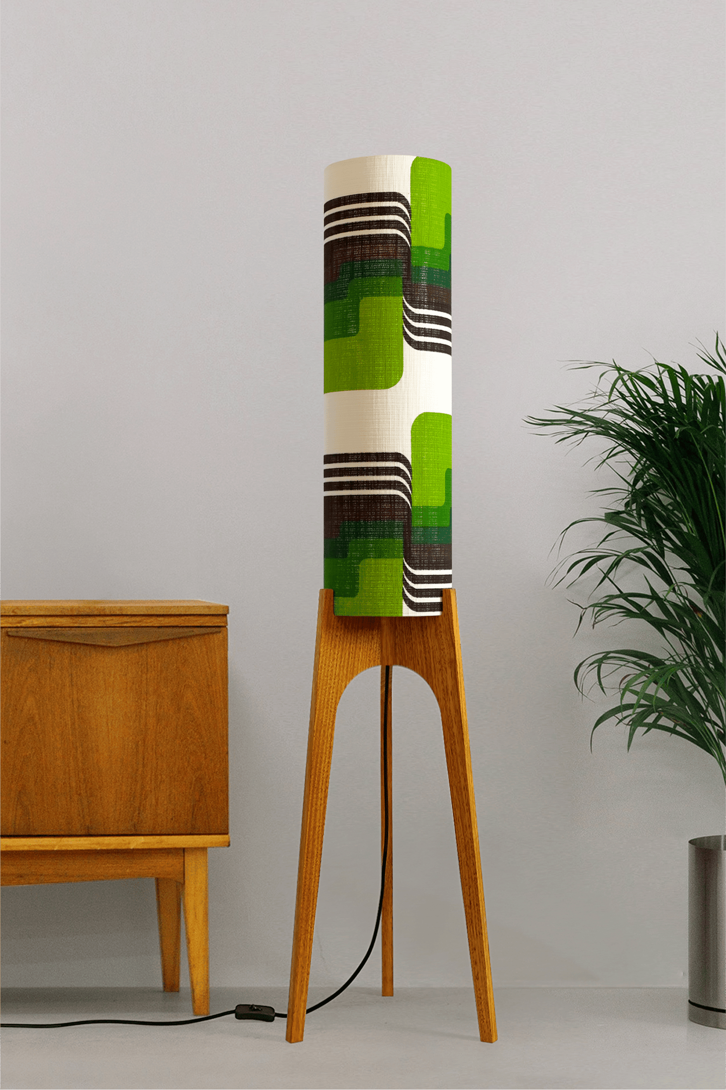 Fern - Archie Rocket floor lamp with handmade wooden base and handcrafted lampshade from vintage fabric with retro geometric patterns in green, brown, and white.