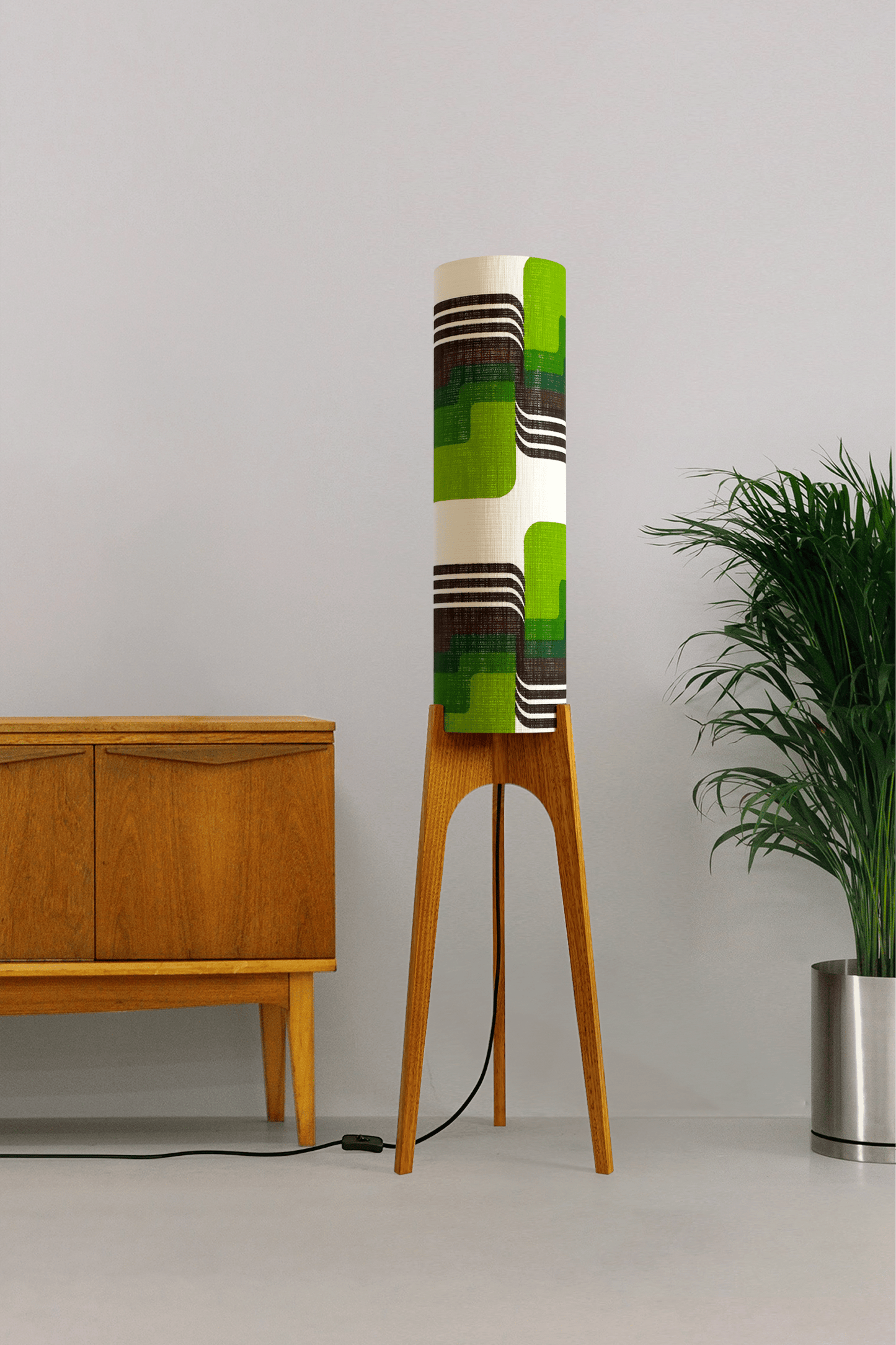 Fern - Archie Rocket floor lamp with handmade wooden base and handcrafted lampshade from vintage fabric with retro geometric patterns in green, brown, and white.