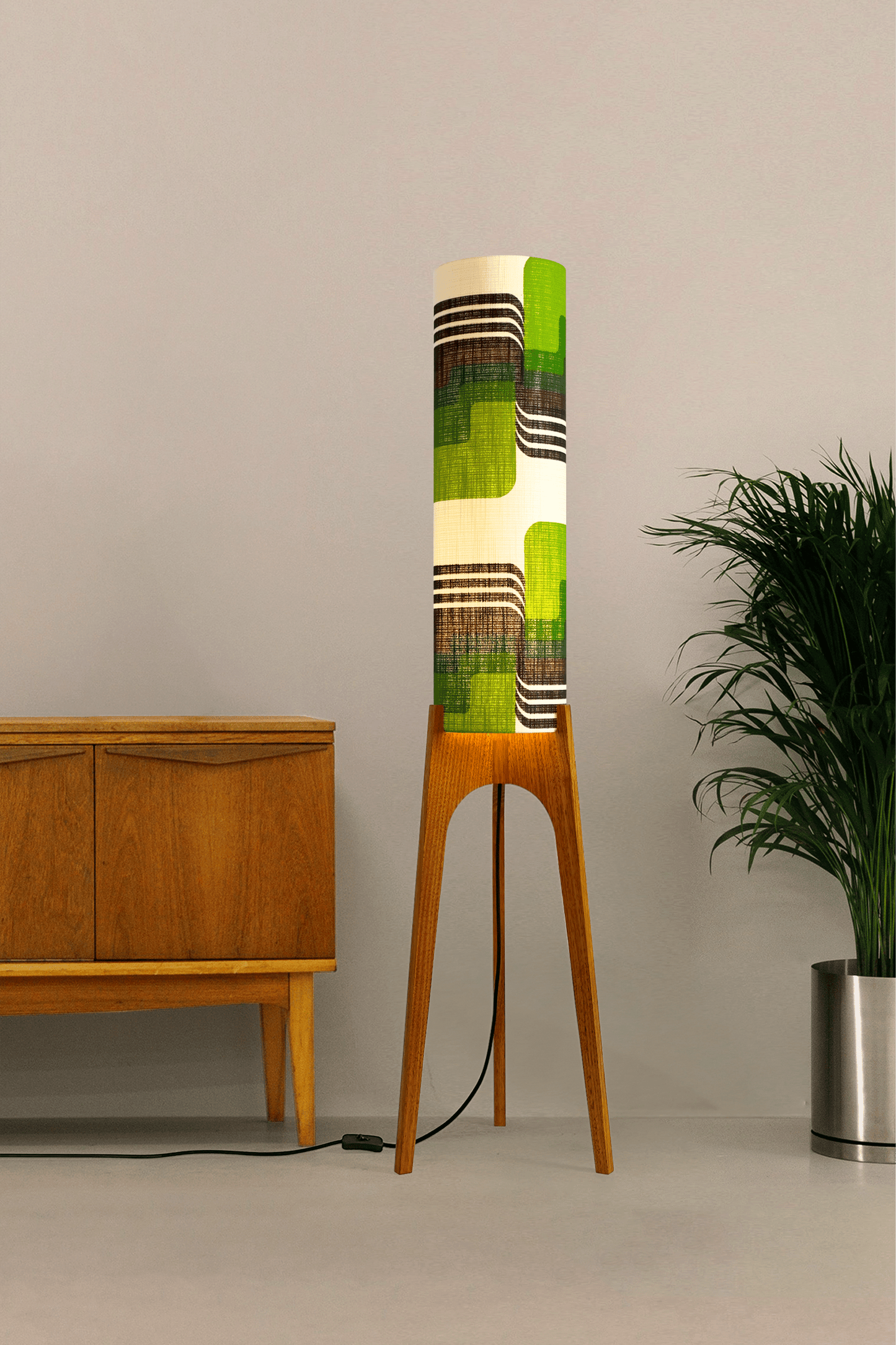 Fern - Archie Rocket floor lamp with handmade wooden base and handcrafted lampshade from vintage fabric with retro geometric patterns in green, brown, and white.