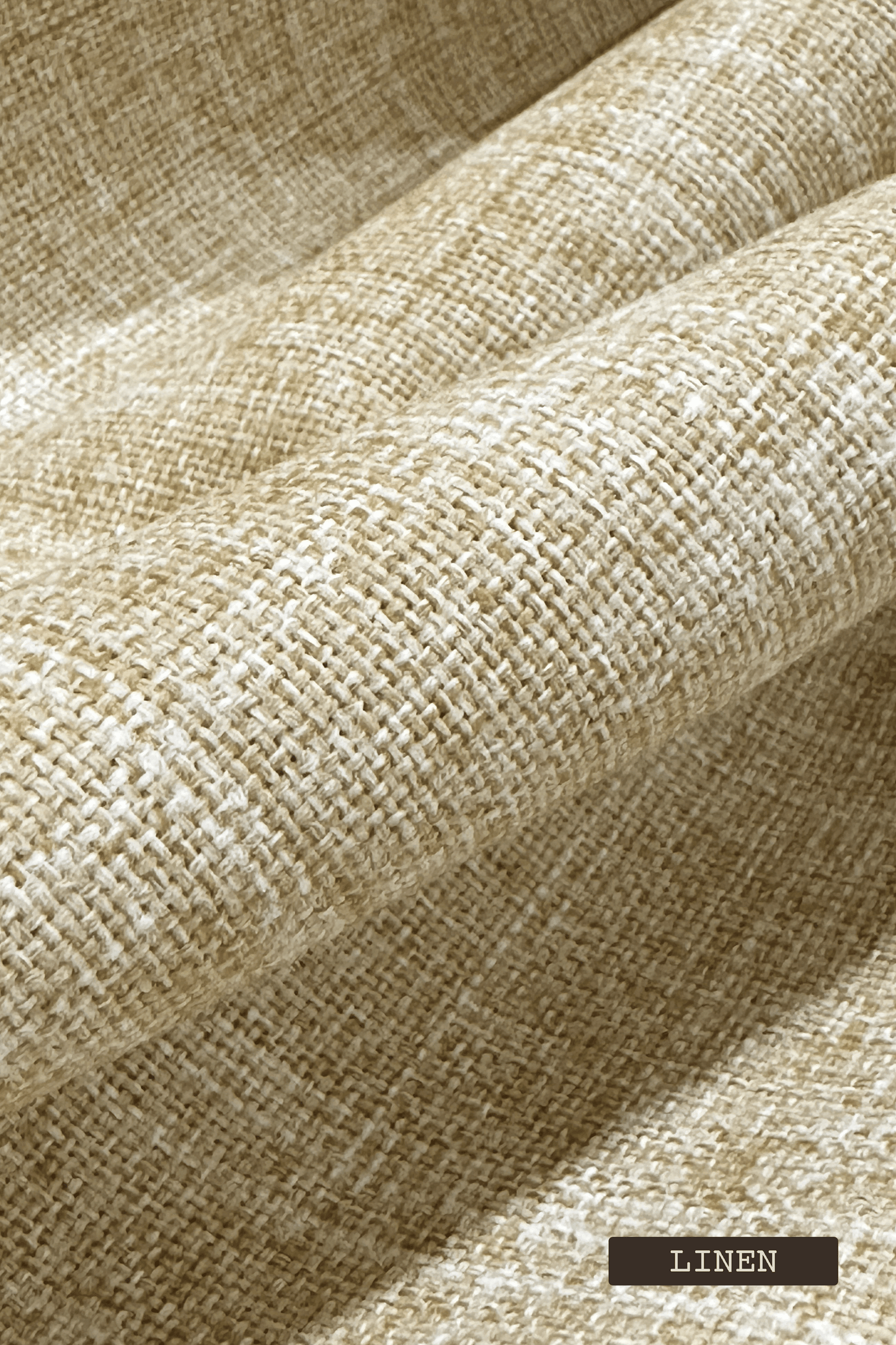 Close-up of beige linen fabric with a label indicating 'LINEN'.