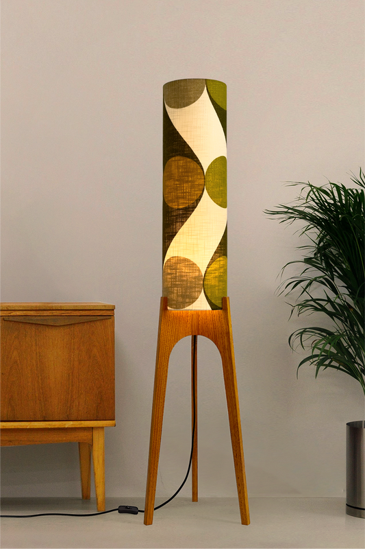 Olli - Archie Rocket Floor Lamp handmade by Retro Duo, from vintage geometric patterned fabric lampshade and wooden lamp base in a room with a wooden cabinet and plant.