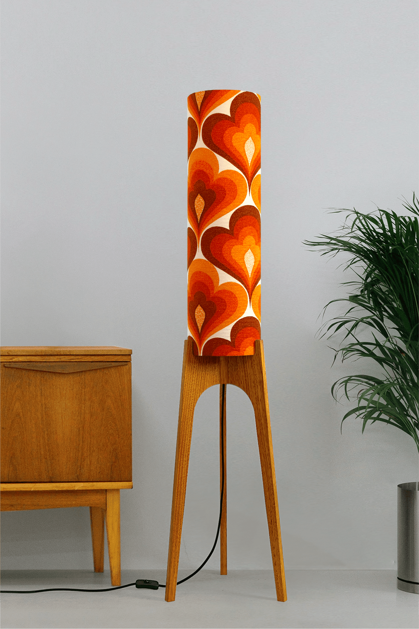 70s Love - Archie Rocket floor lamp with a vibrant orange and red heart-patterned shade made with authentic vintage fabric