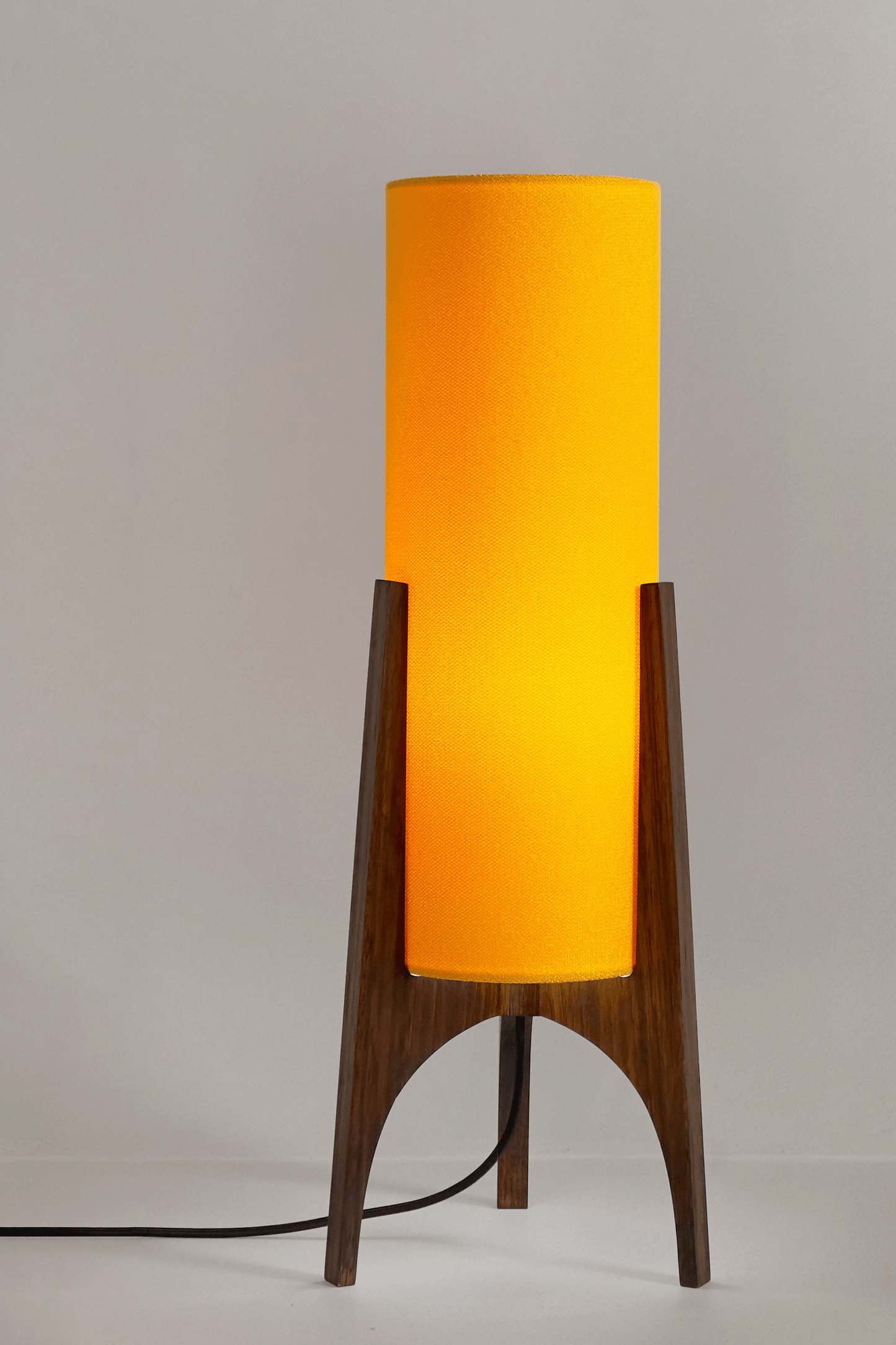 Encore - Recycled Fabric | Archie Rocket Table Lamp in Canary with lights on
