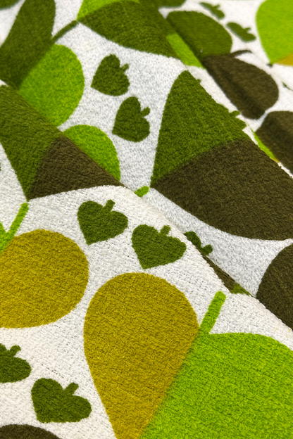 Alfie - authentic vintage geometric fabric with heart-like motif in shades of apple green, moss and warm forest green 