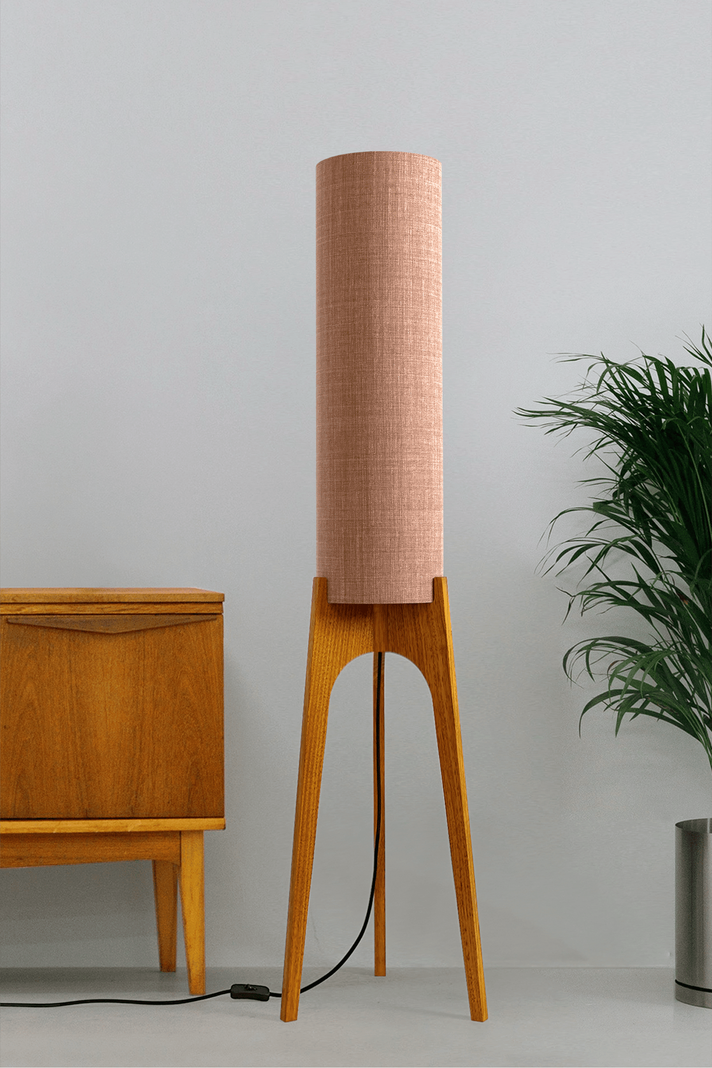 Blush Archie Rocket Wooden floor lamp with a cylindrical shade on a neutral background