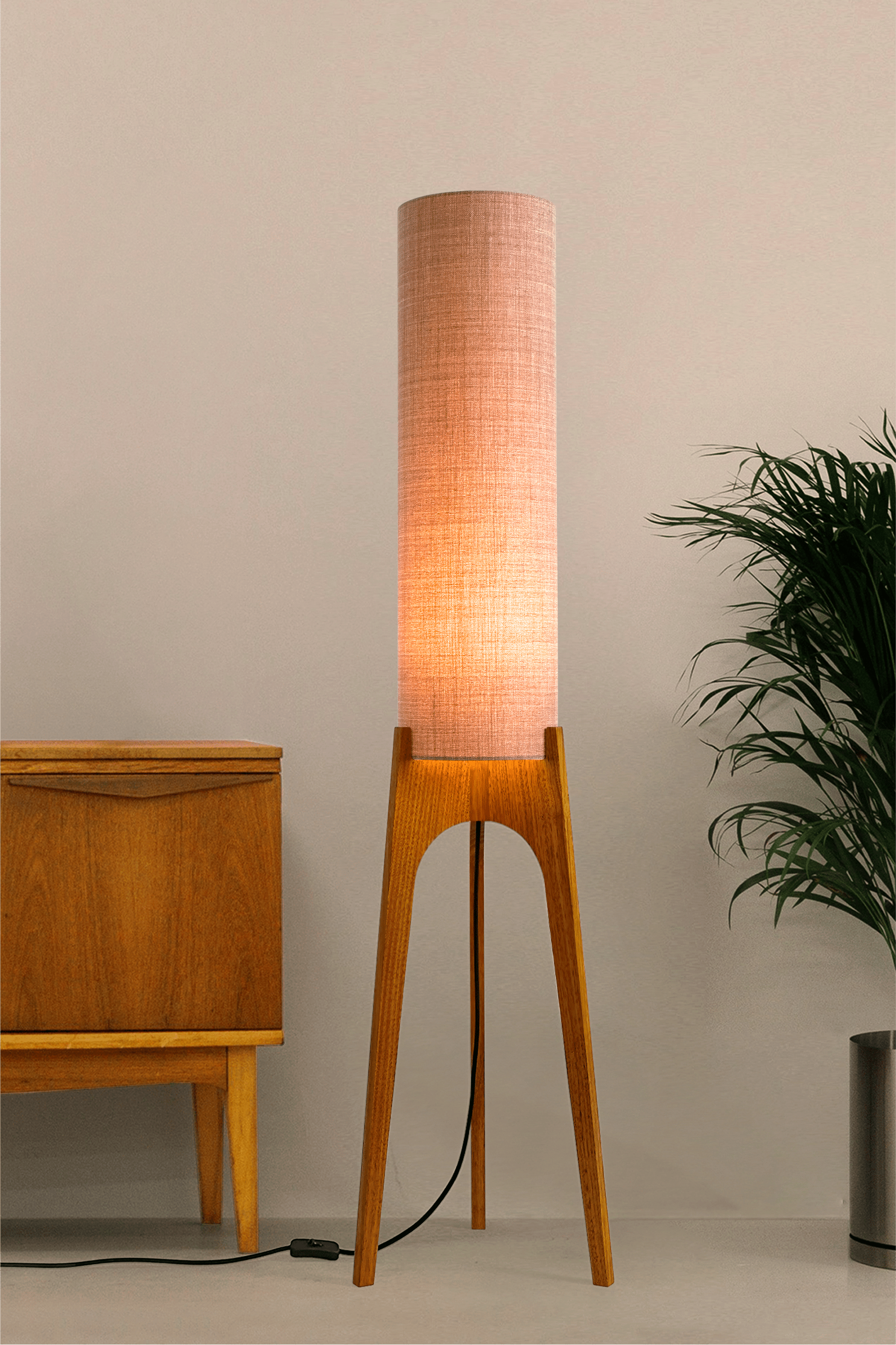 Blush Archie Rocket Wooden floor lamp with a cylindrical shade on a neutral background