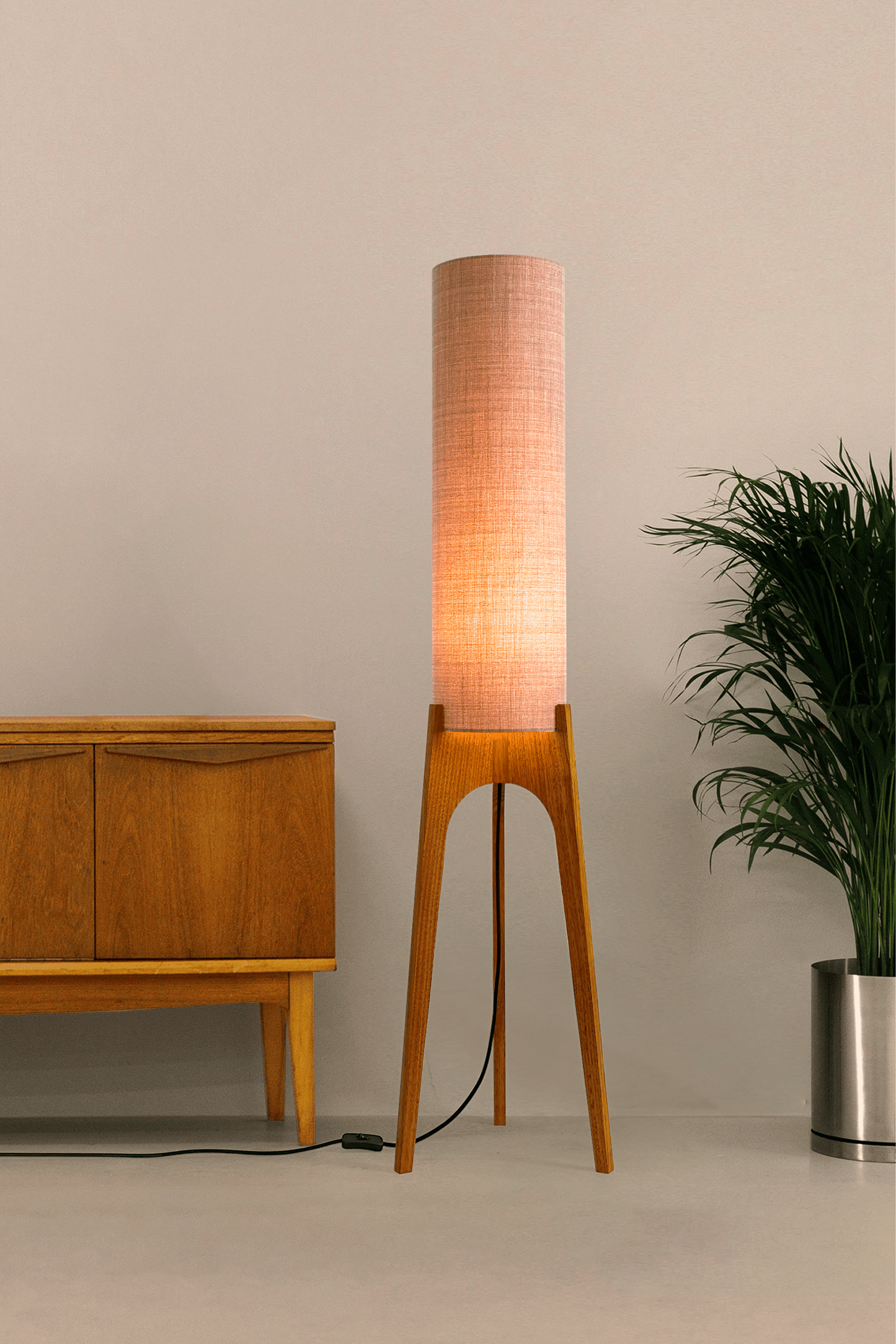 Blush Archie Rocket Wooden floor lamp with a cylindrical shade on a neutral background