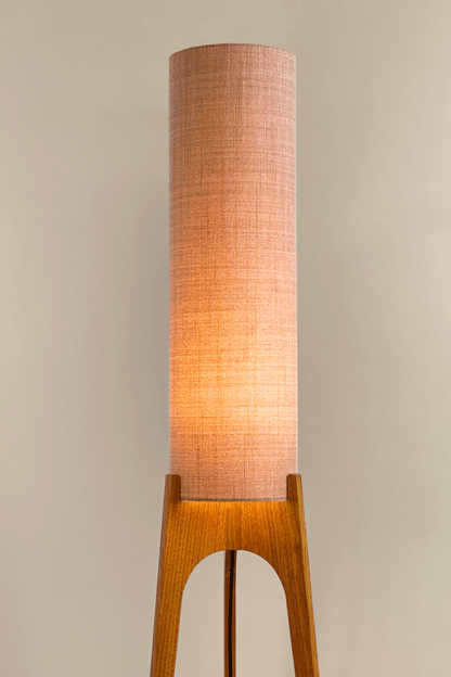 Blush Archie Rocket Wooden floor lamp with a cylindrical shade on a neutral background