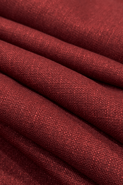 Close-up of red fabric with a textured pattern