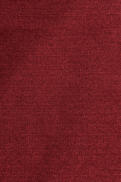 Close-up of a red burgundy textured red fabric surface