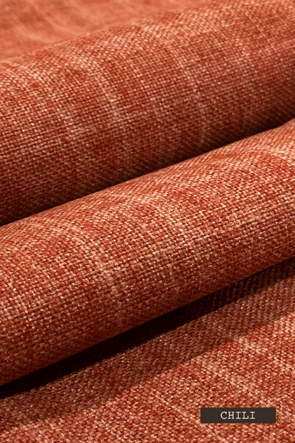 Close-up of green fabric with 'Chili' label