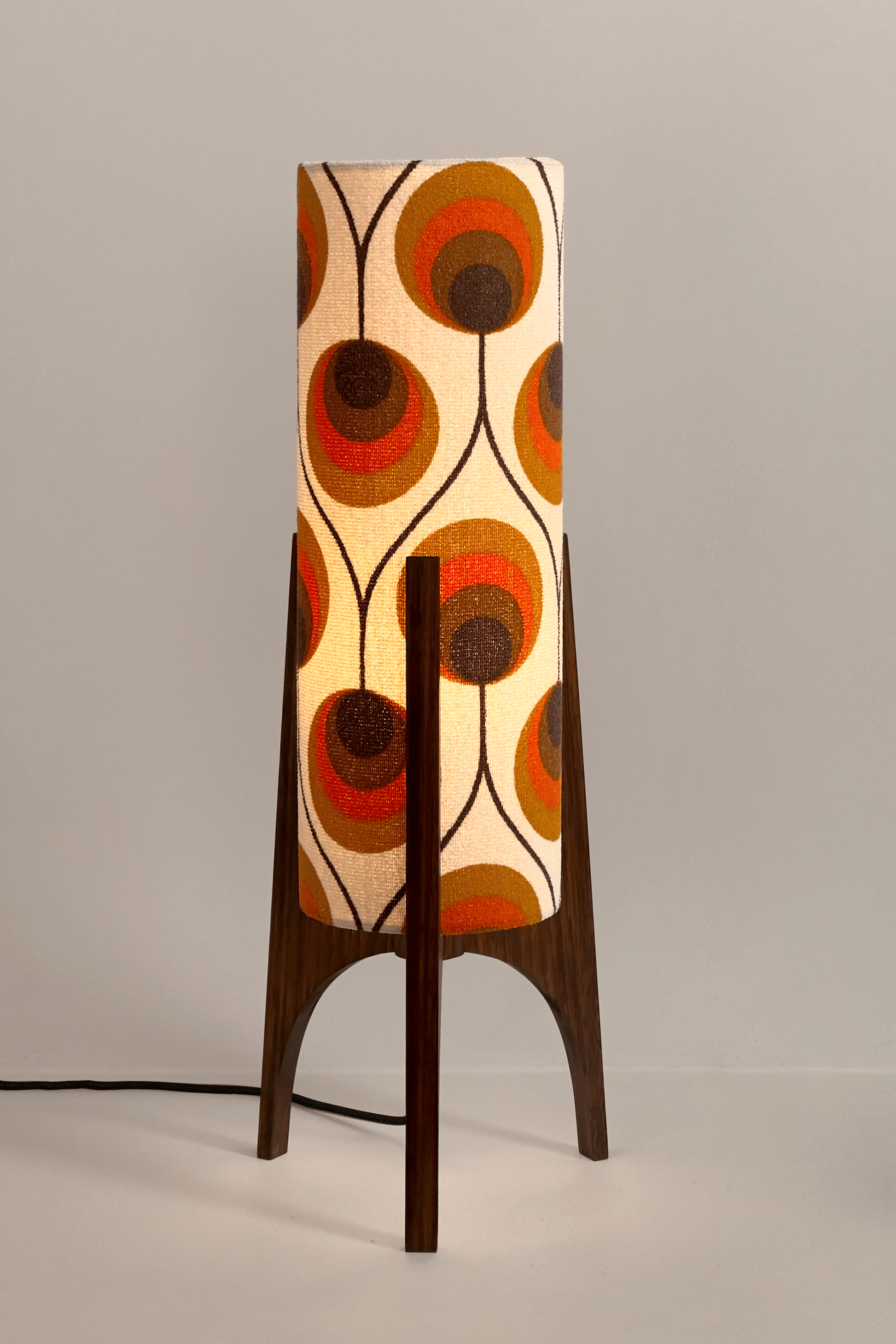 Handcrafted Archie Rocket Table lamp with a vintage geometric patterned fabric shade in orange and brown tones, pair with a handmade wooden base