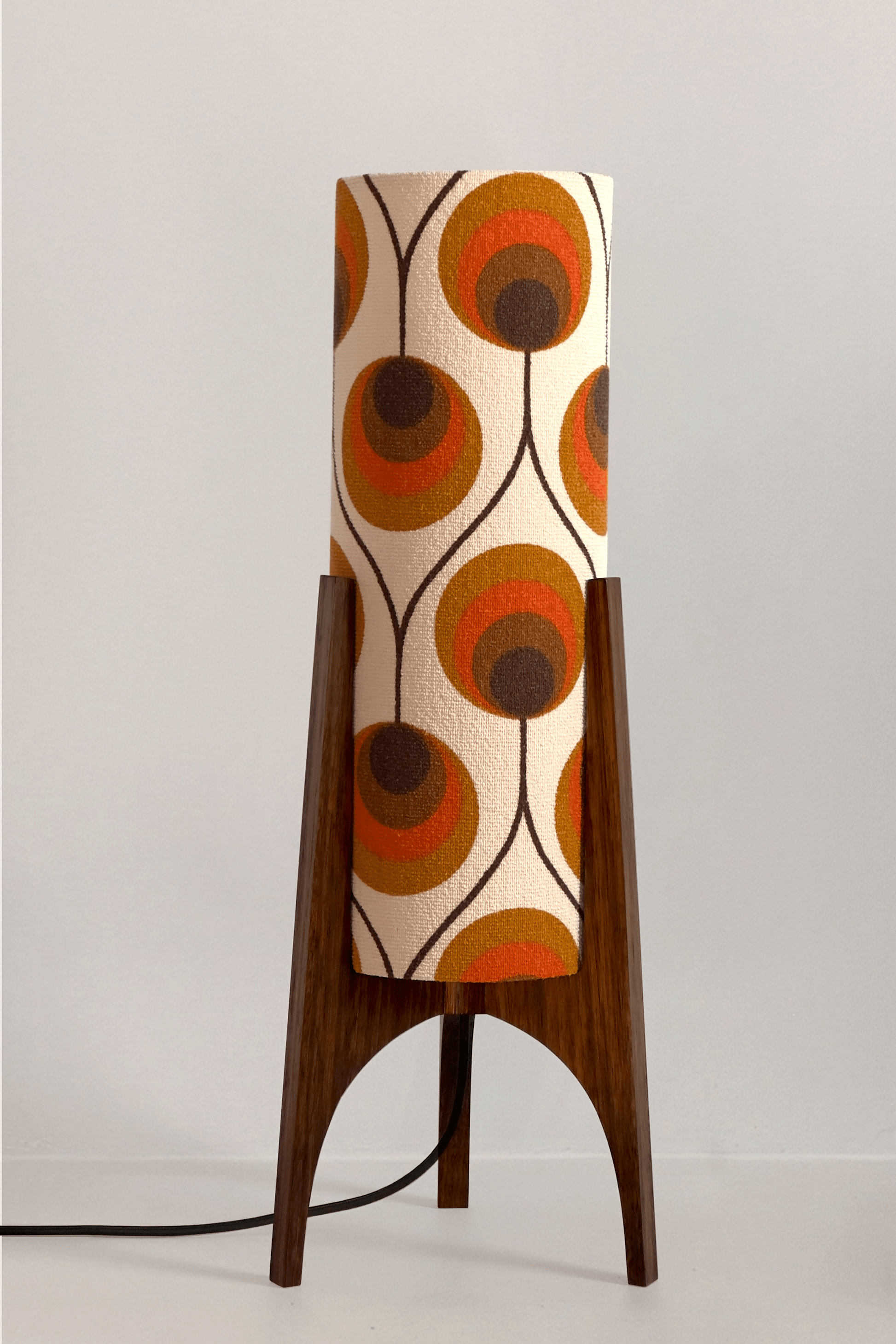Handcrafted Archie Rocket Table lamp with a vintage geometric patterned fabric shade in orange and brown tones, pair with a handmade wooden base