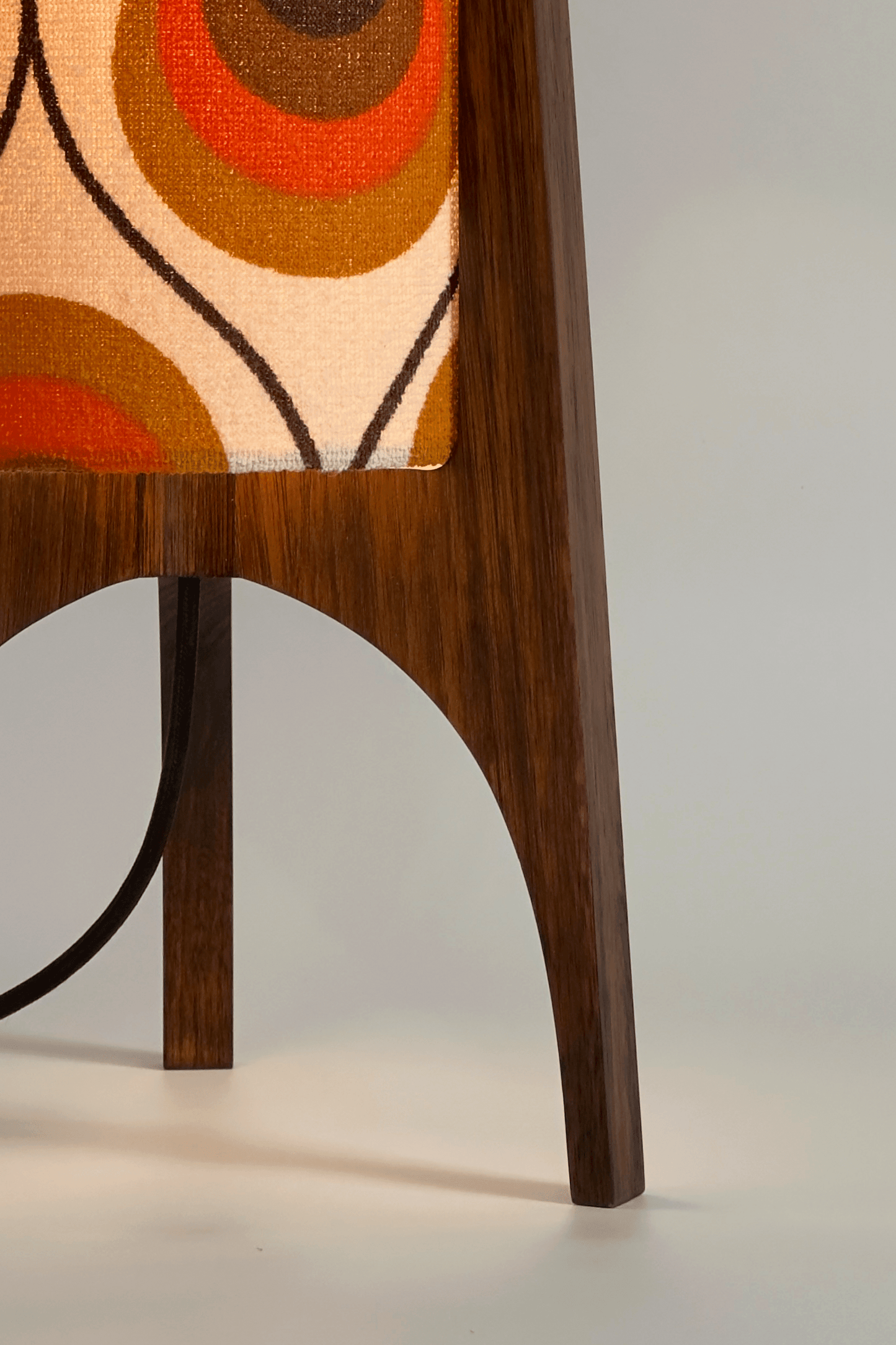 Handcrafted Archie Rocket Table lamp with a vintage geometric patterned fabric shade in orange and brown tones, pair with a handmade wooden base
