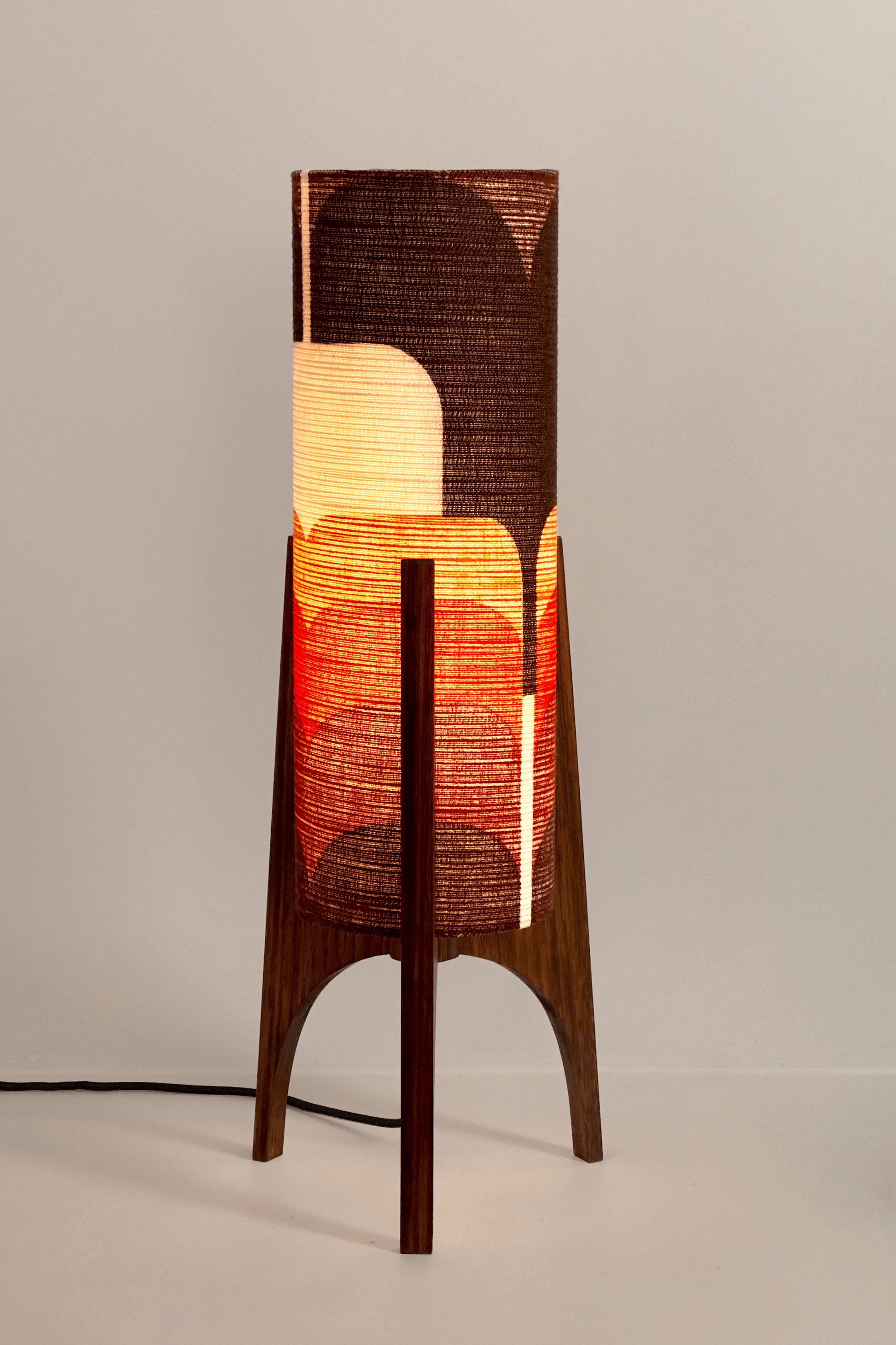 Dawn - Handcrafted Archie Rocket Table lamp with a vintage geometric patterned fabric shade in red and orange tones and wooden base
