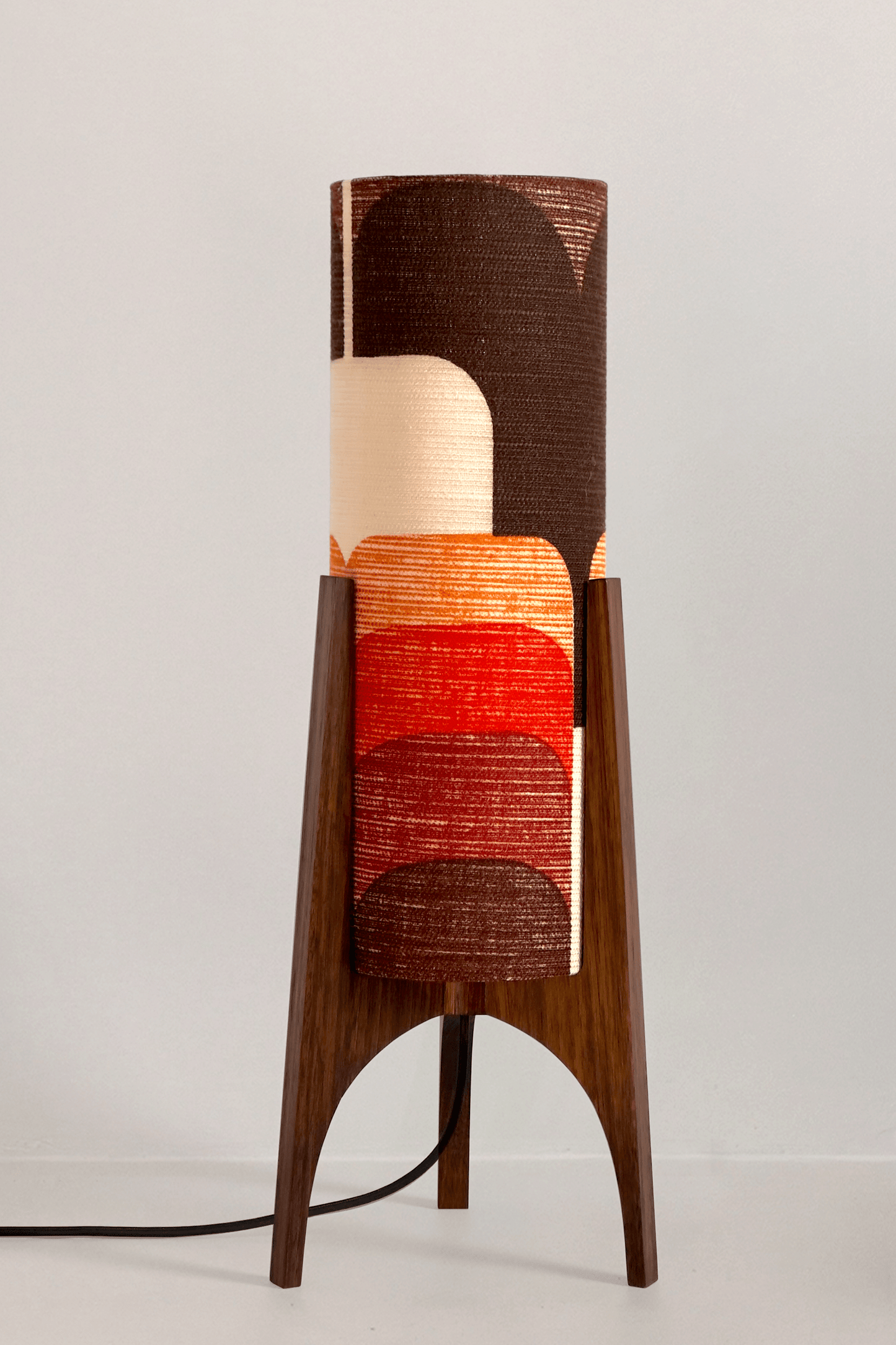 Dawn - Handcrafted Archie Rocket Table lamp with a vintage geometric patterned fabric shade in red and orange tones and wooden base