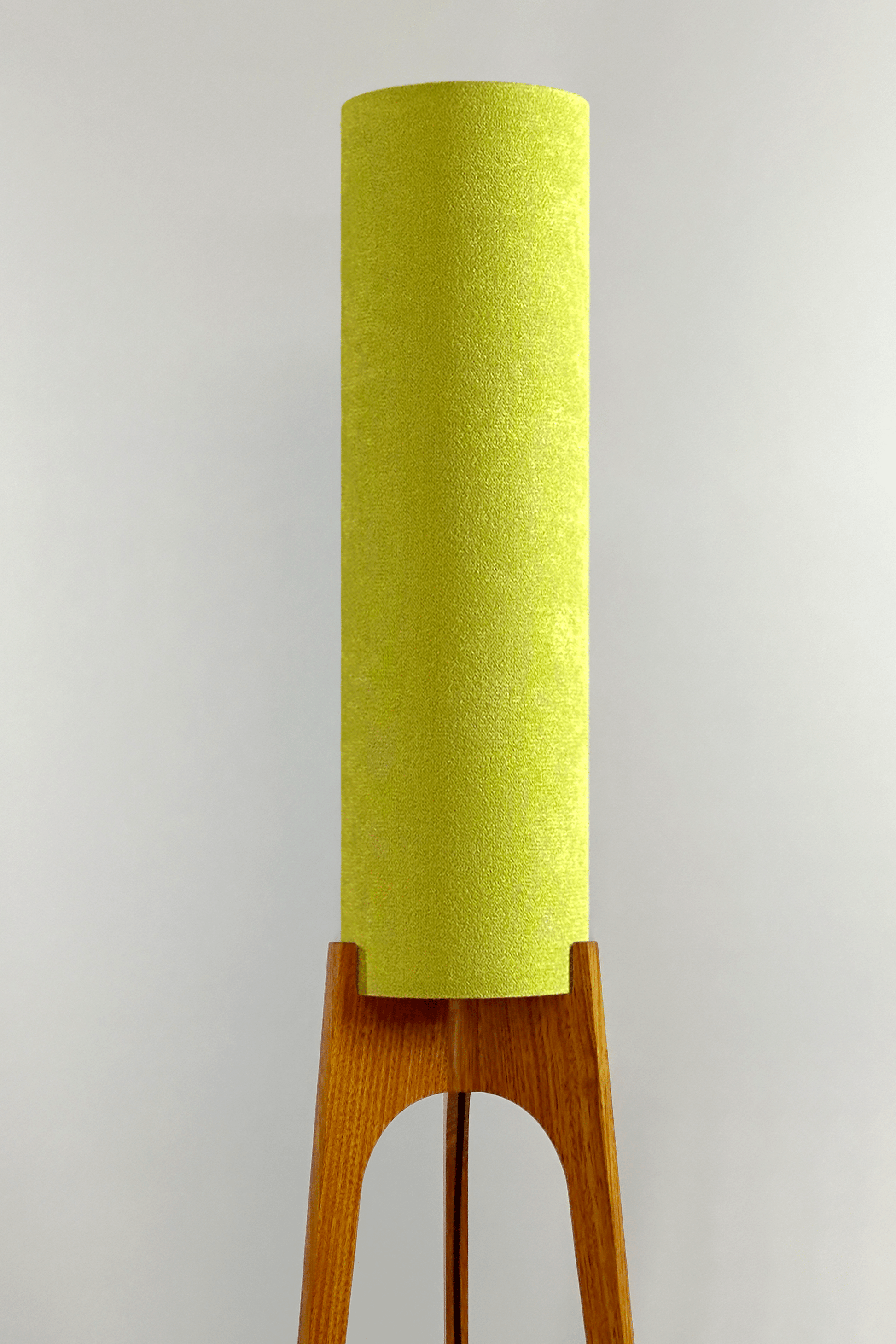 Handmade Archie Rocket Floor Lamp with a cylindrical lampshade in Avocado &  a wooden base.
