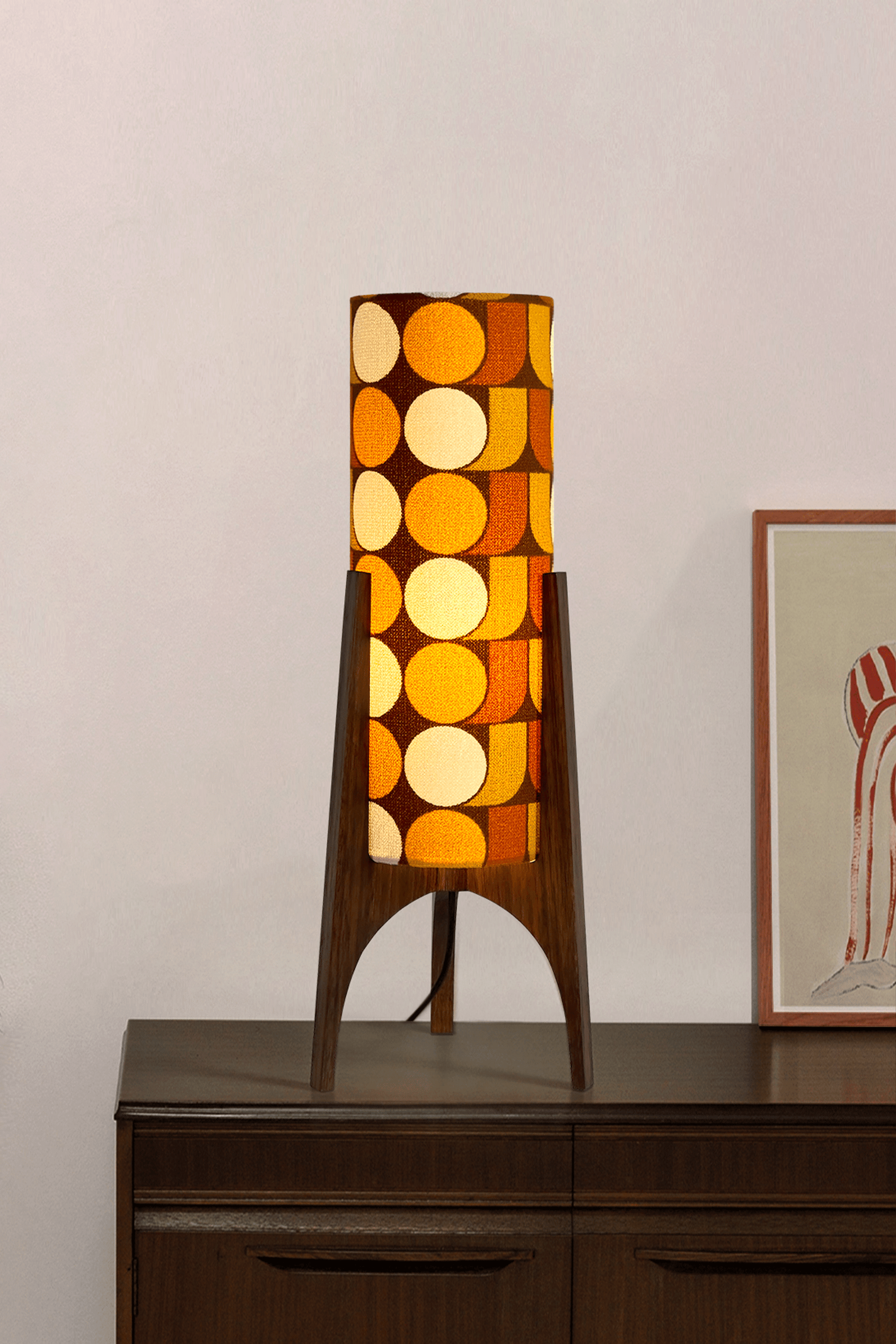 June - Handmade Archie Rocket Table lamp with a vintage geometric patterned fabric shade in yellow, brown and mustard tones, paired with a wooden base