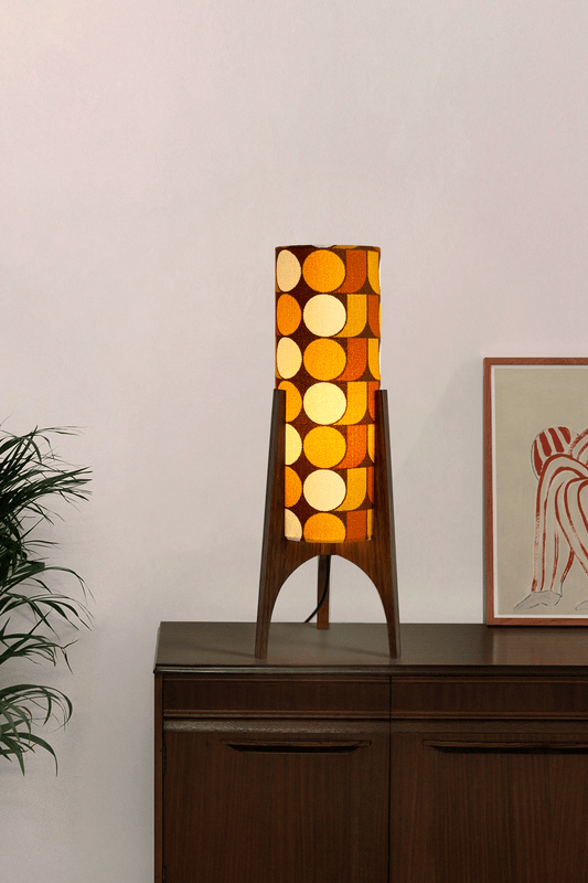 June - Handmade Archie Rocket Table lamp with a vintage geometric patterned fabric shade in yellow, brown and mustard tones, paired with a wooden base