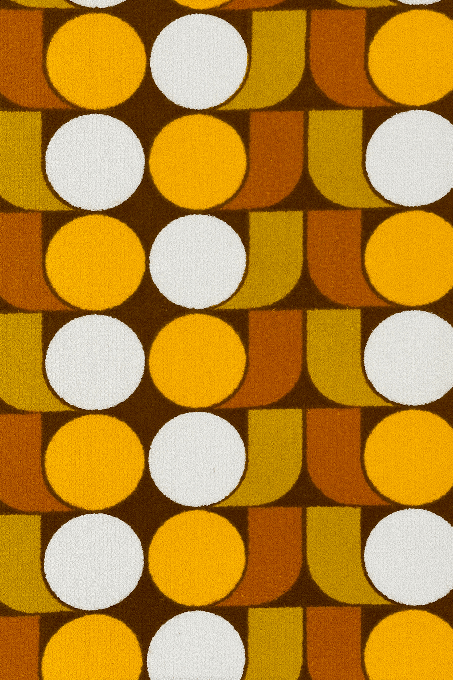 Vintage terry cloth fabric featuring egg-yolk yellow, mustard, warm brown, and soft cream tones, the pattern brings together rhythmic circles and curved geometric forms
