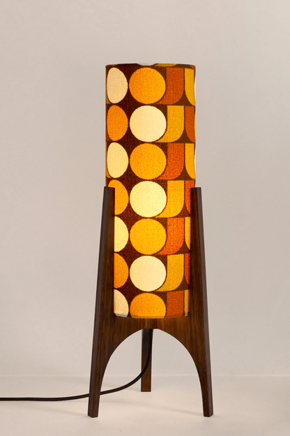 June - Handmade Archie Rocket Table lamp with a vintage geometric patterned fabric shade in yellow, brown and mustard tones, paired with a wooden base