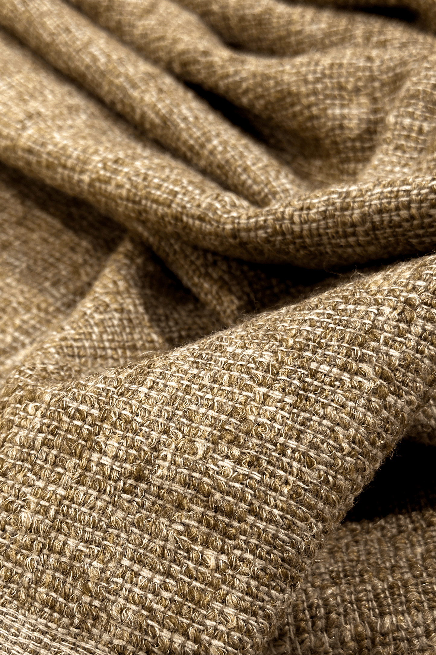 Close-up of textured brown fabric