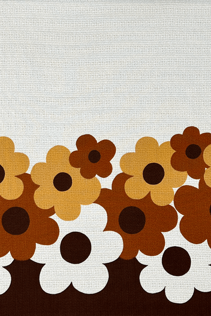 Pattern of brown, orange, and white flowers on a textured vintage fabric background