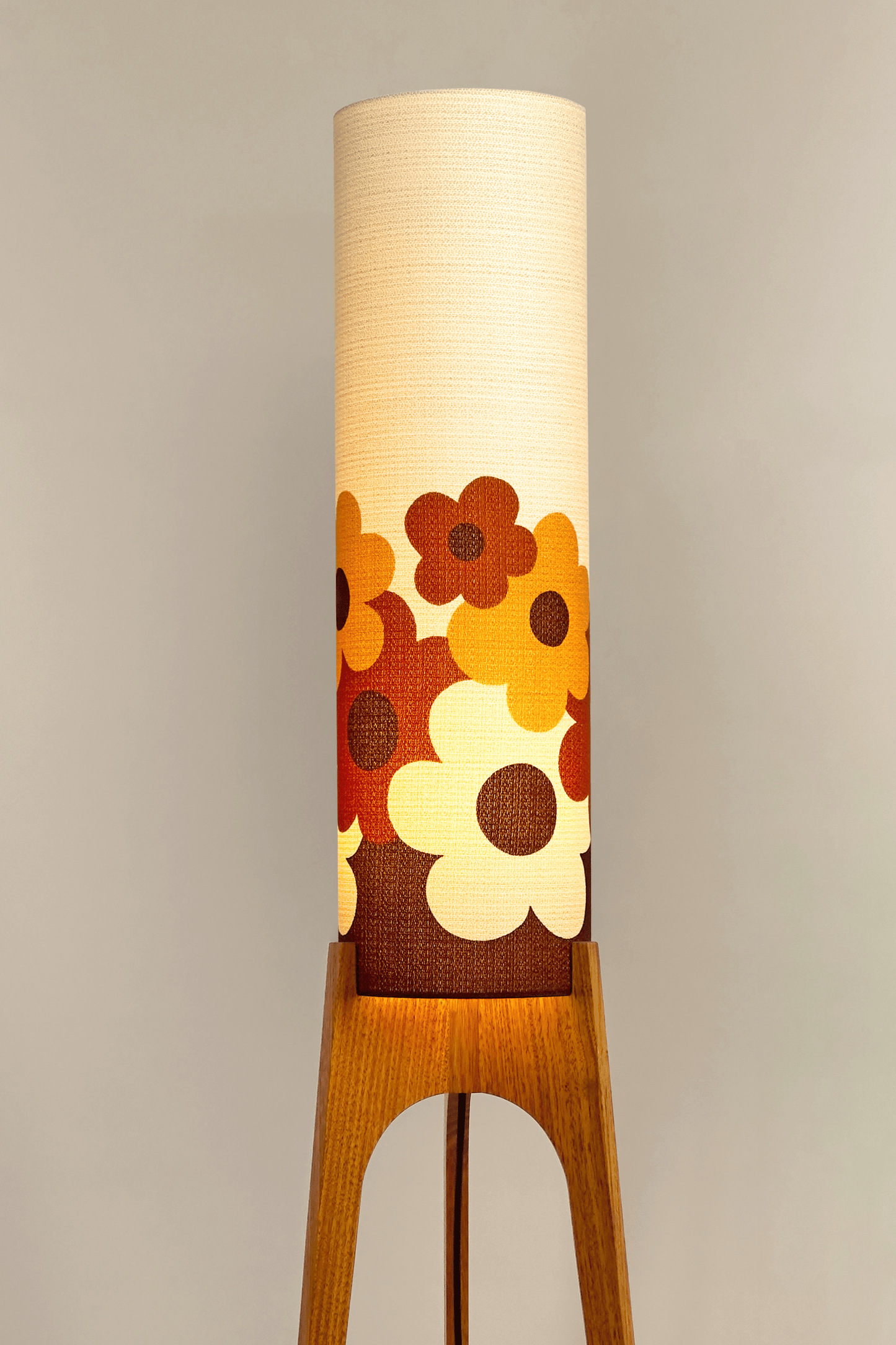 Handmade Rocket Floor Lamp with a floral design lampshade made with vintage fabric on a neutral background
