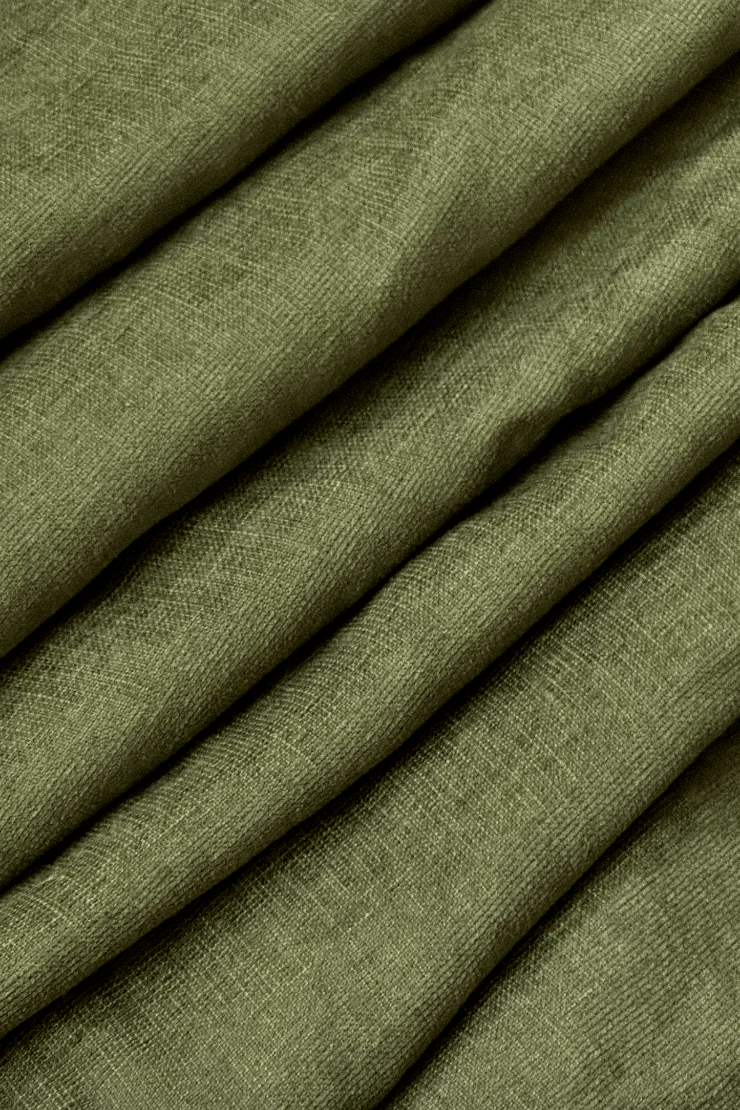 Close-up of olive green fabric with a textured pattern