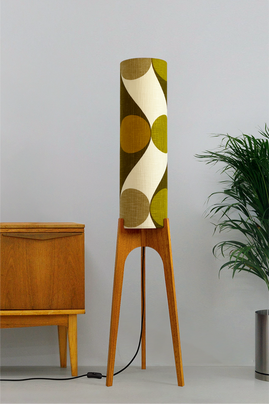 Olli - Archie Rocket Floor Lamp handmade by Retro Duo, from vintage geometric patterned fabric lampshade and wooden lamp base in a room with a wooden cabinet and plant.