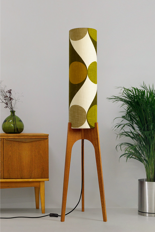 Olli - Archie Rocket Floor Lamp handmade by Retro Duo, from vintage geometric patterned fabric lampshade and wooden lamp base in a room with a wooden cabinet and plant.