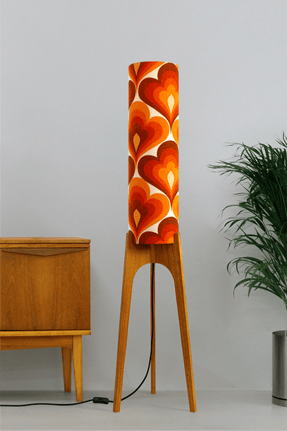 70s Love - Archie Rocket floor lamp with a vibrant orange and red heart-patterned shade made with authentic vintage fabric