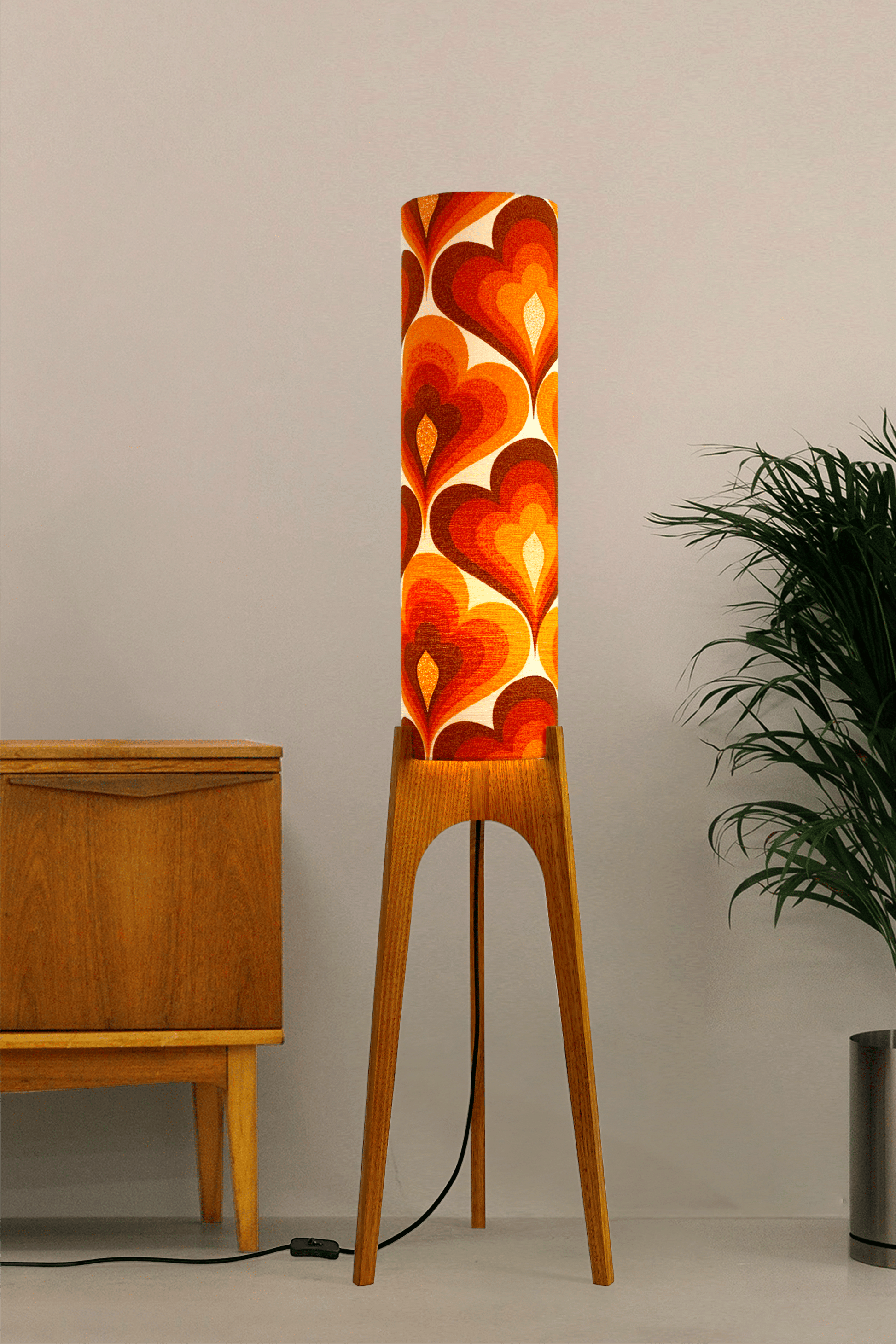 70s Love - Archie Rocket floor lamp with a vibrant orange and red heart-patterned shade made with authentic vintage fabric