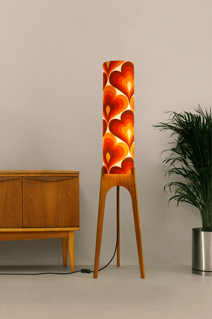 70s Love - Archie Rocket floor lamp with a vibrant orange and red heart-patterned shade made with authentic vintage fabric