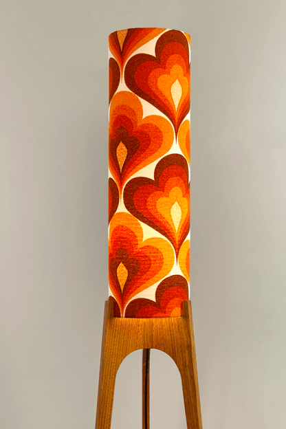 70s Love - Archie Rocket floor lamp with a vibrant orange and red heart-patterned shade made with authentic vintage fabric