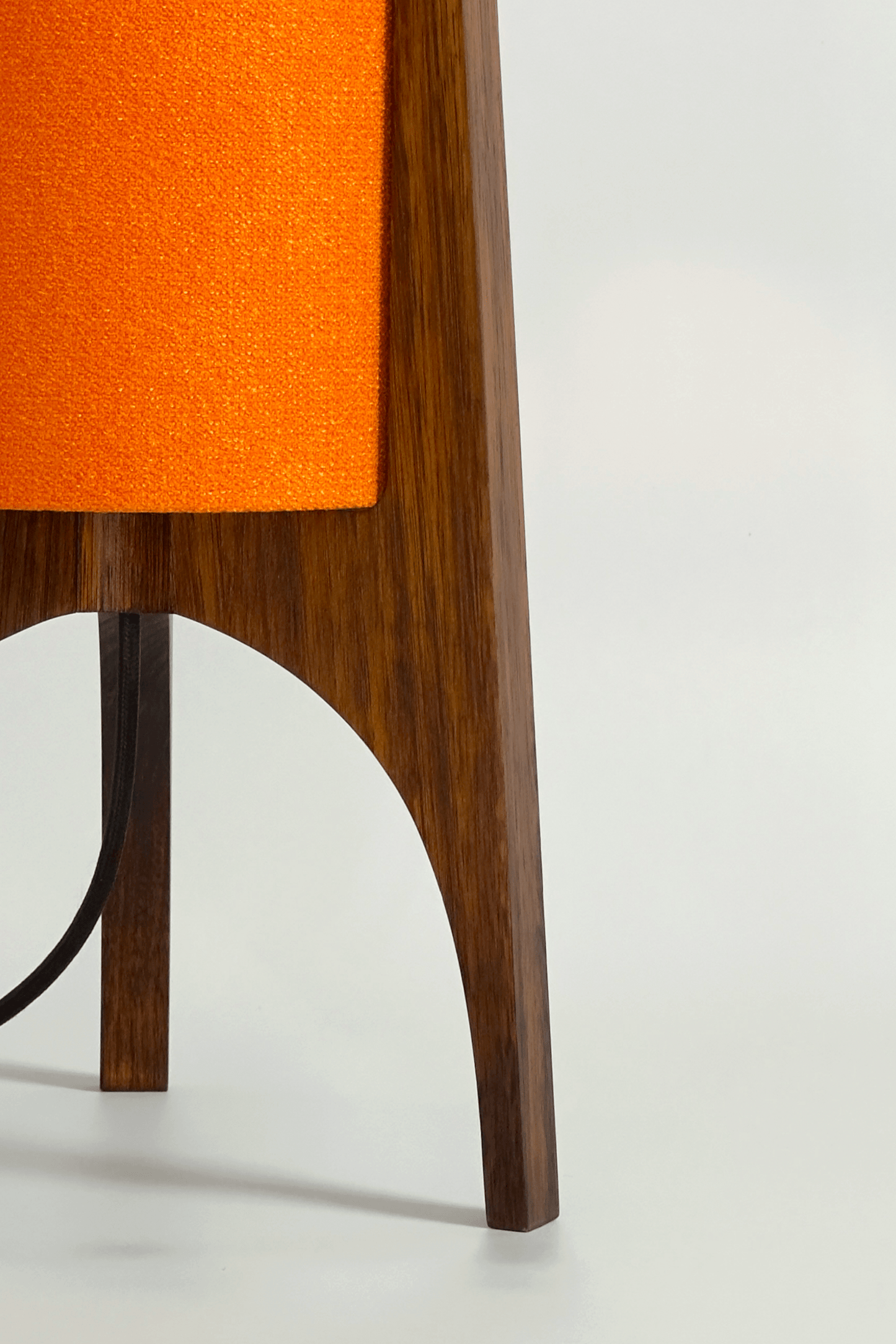 Orange Archie Rocket Table lamp with a handmade wooden base and recycled fabric shade.