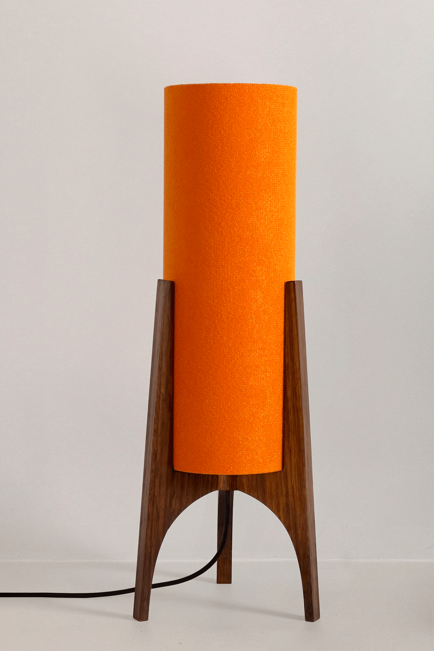 Orange Archie Rocket Table lamp with a handmade wooden base and recycled fabric shade.