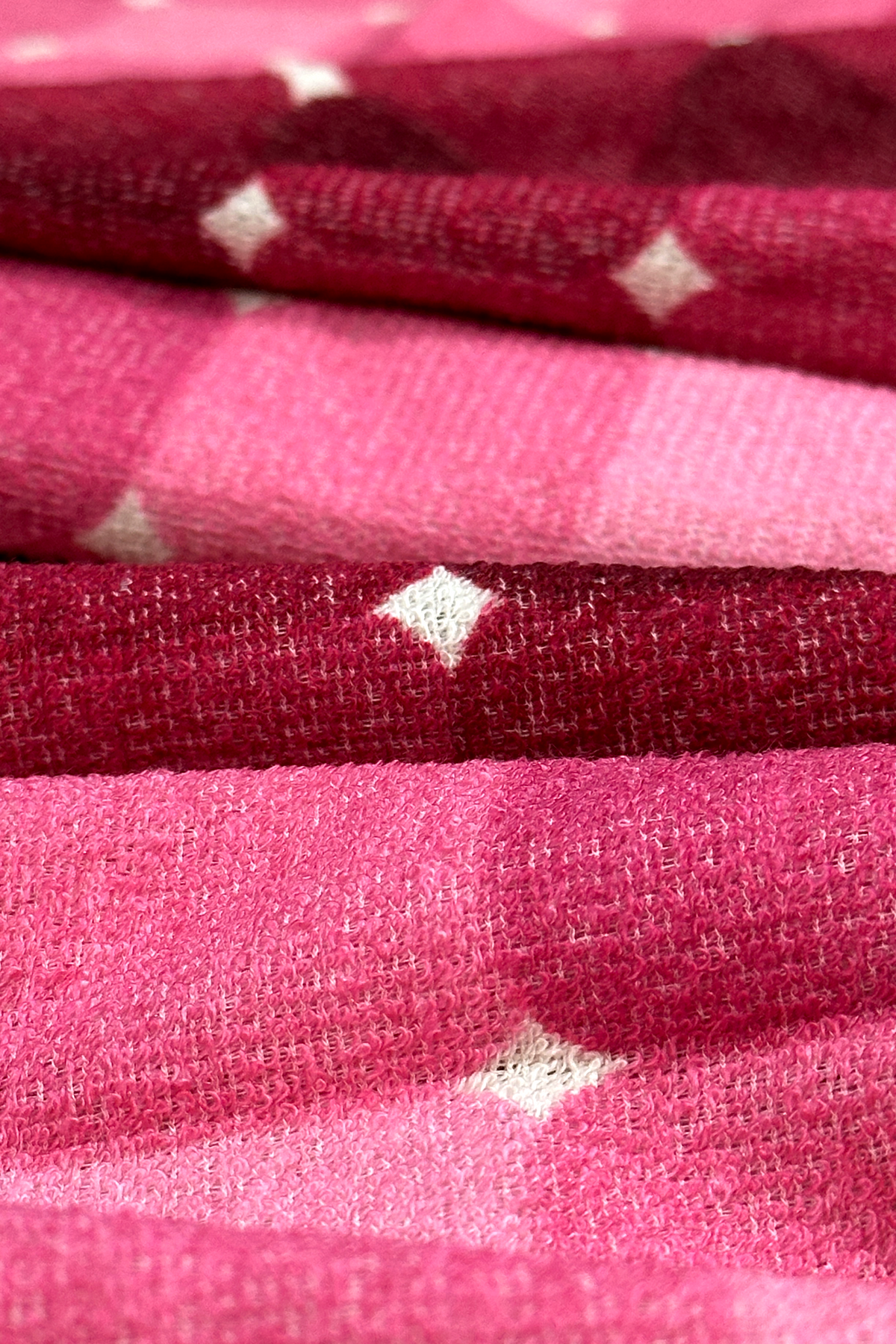 Roxy - Authentic 70's vintage fabric in in graduating shades of blush pink, raspberry, berry and deep burgundy.