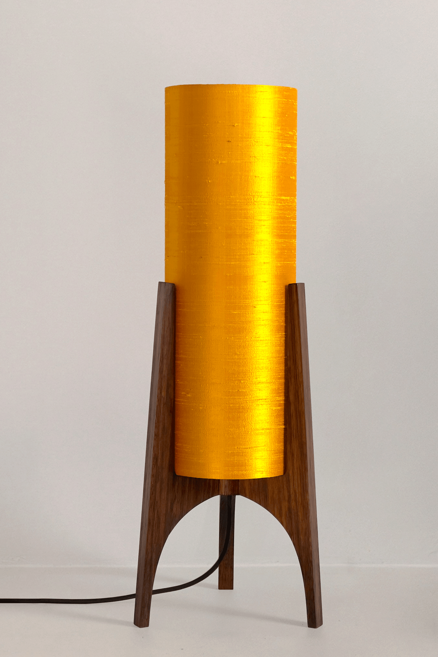 Handmade Wooden Rocket Table Lamp with cylindrical handmade lampshade in premium raw silk, available in Saffron, Marigold, and Hibiscus colour options
