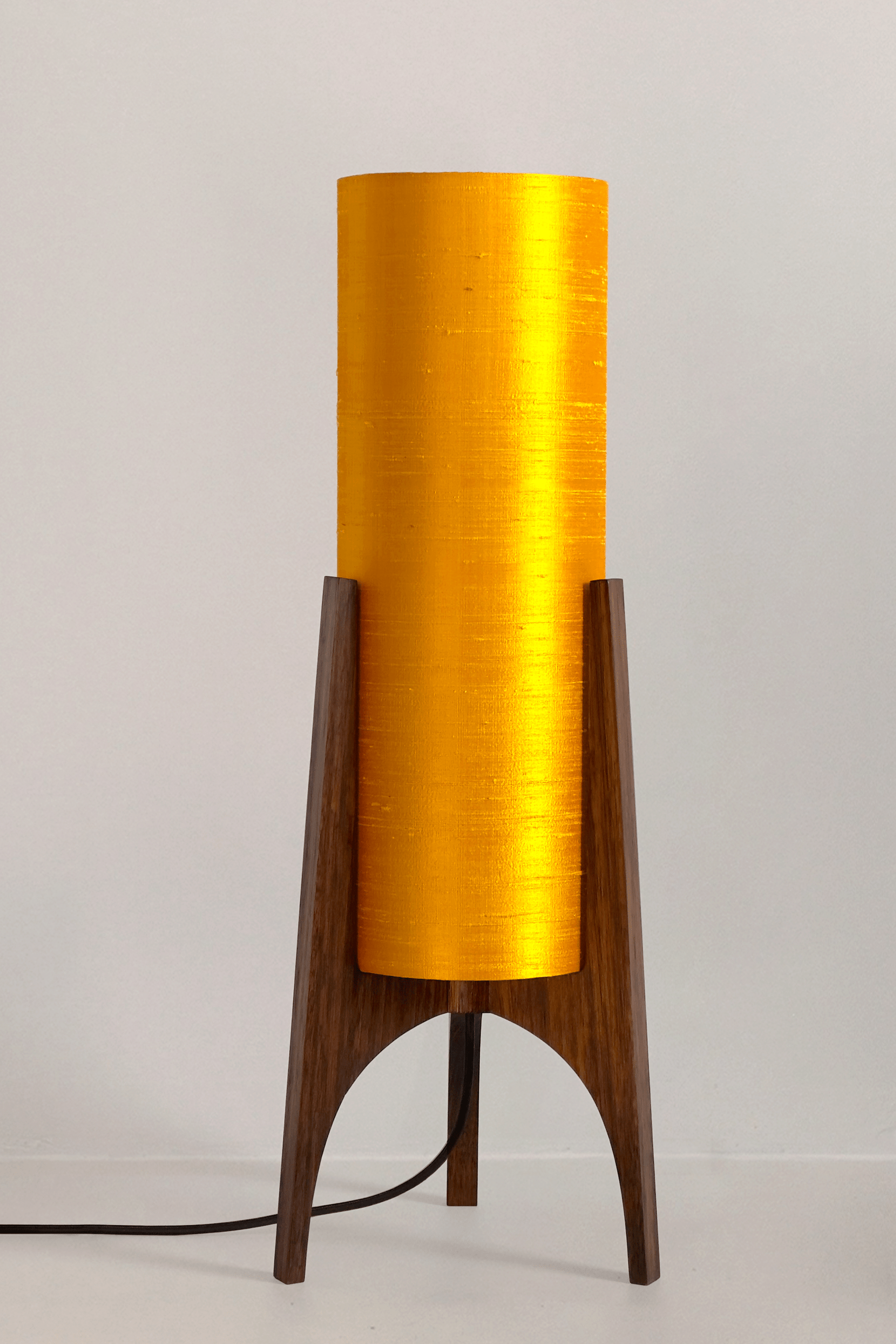 Handmade Wooden Rocket Table Lamp with cylindrical handmade lampshade in premium raw silk, available in Saffron, Marigold, and Hibiscus colour options