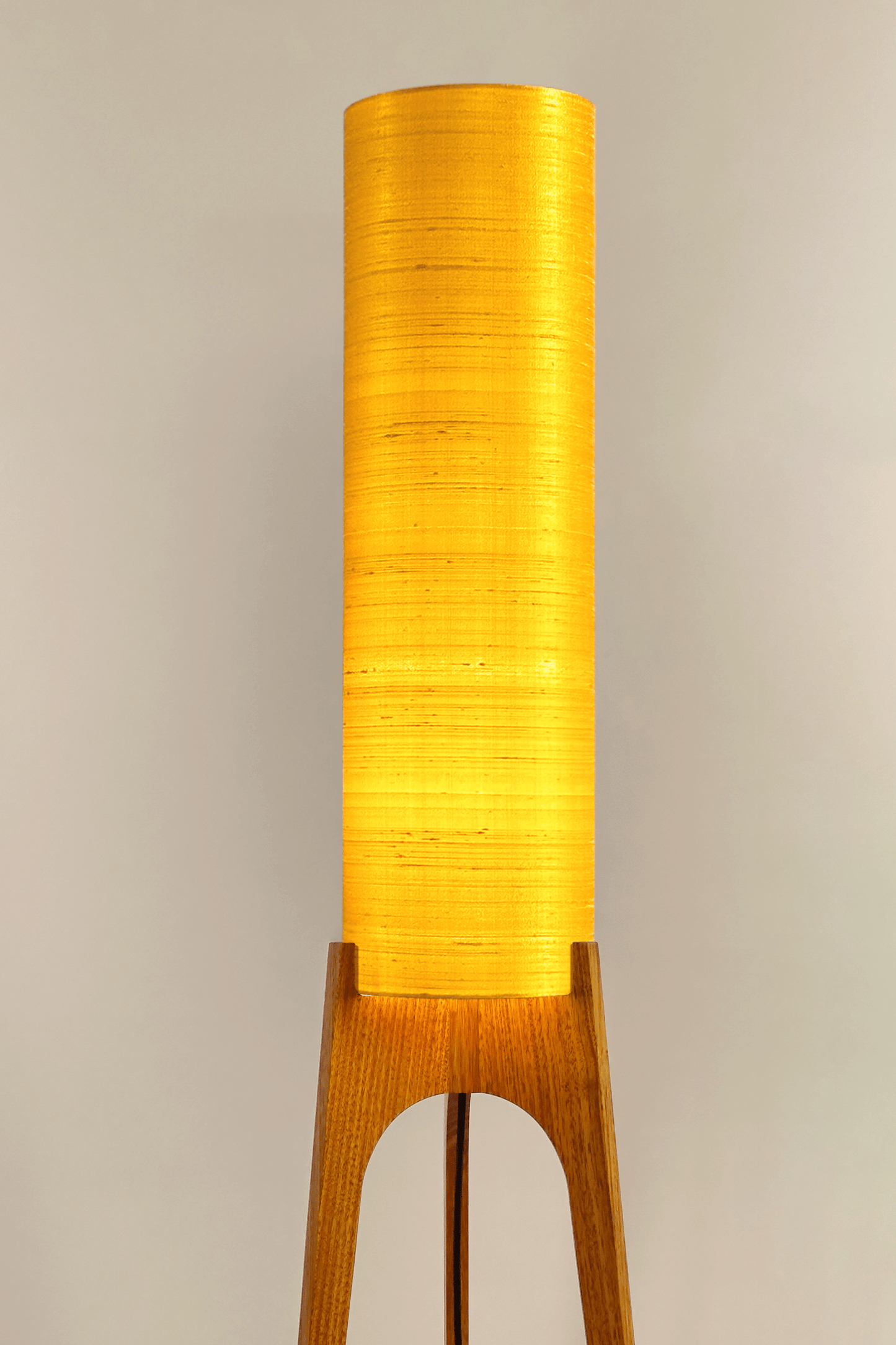 Wooden Rocket Floor Lamp with Saffron Yellow cylindrical handmade lampshade in premium raw silk.