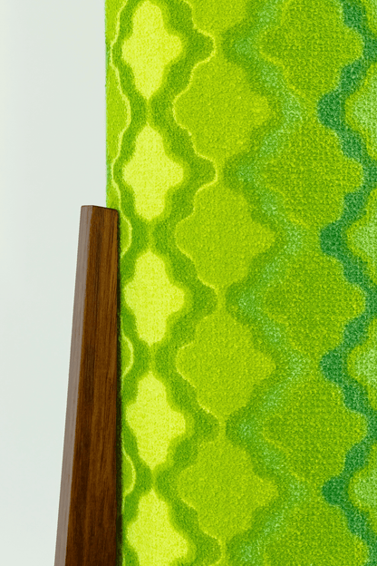 Close-up of Handmade Archie Rocket Table Lamp with yellow-green geometric patterns lampshade made from vintage terry cloth and hardwood base