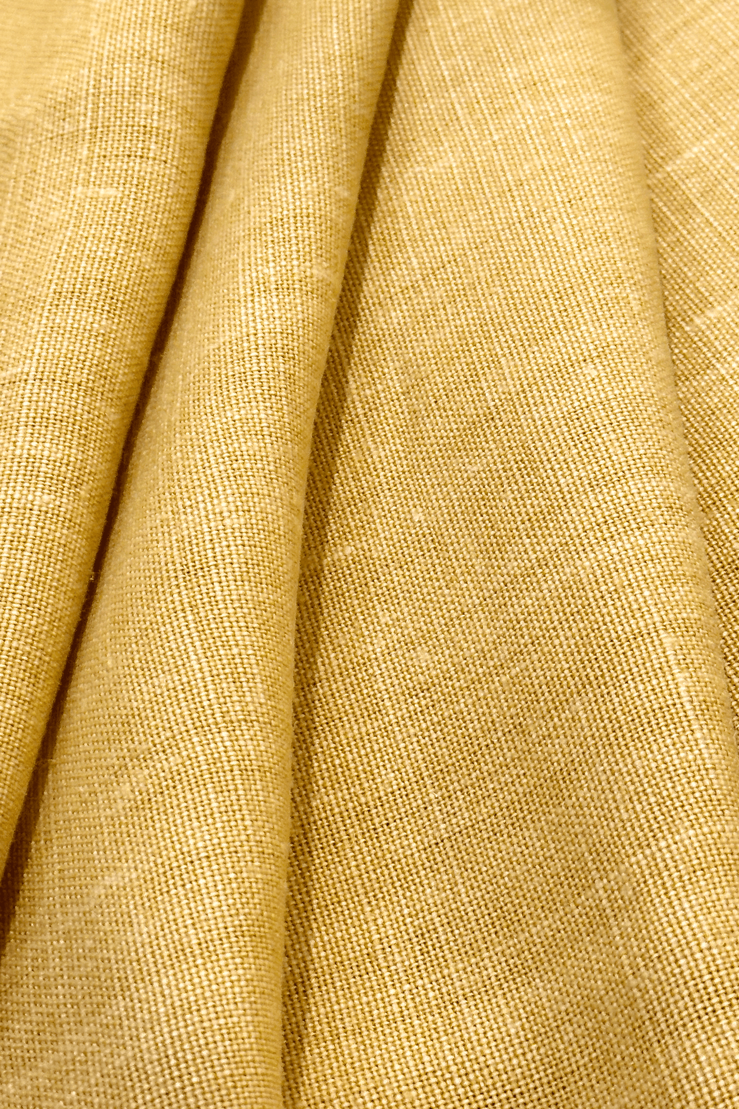 Close-up of premium linen fabric in Wheat colour with a textured pattern