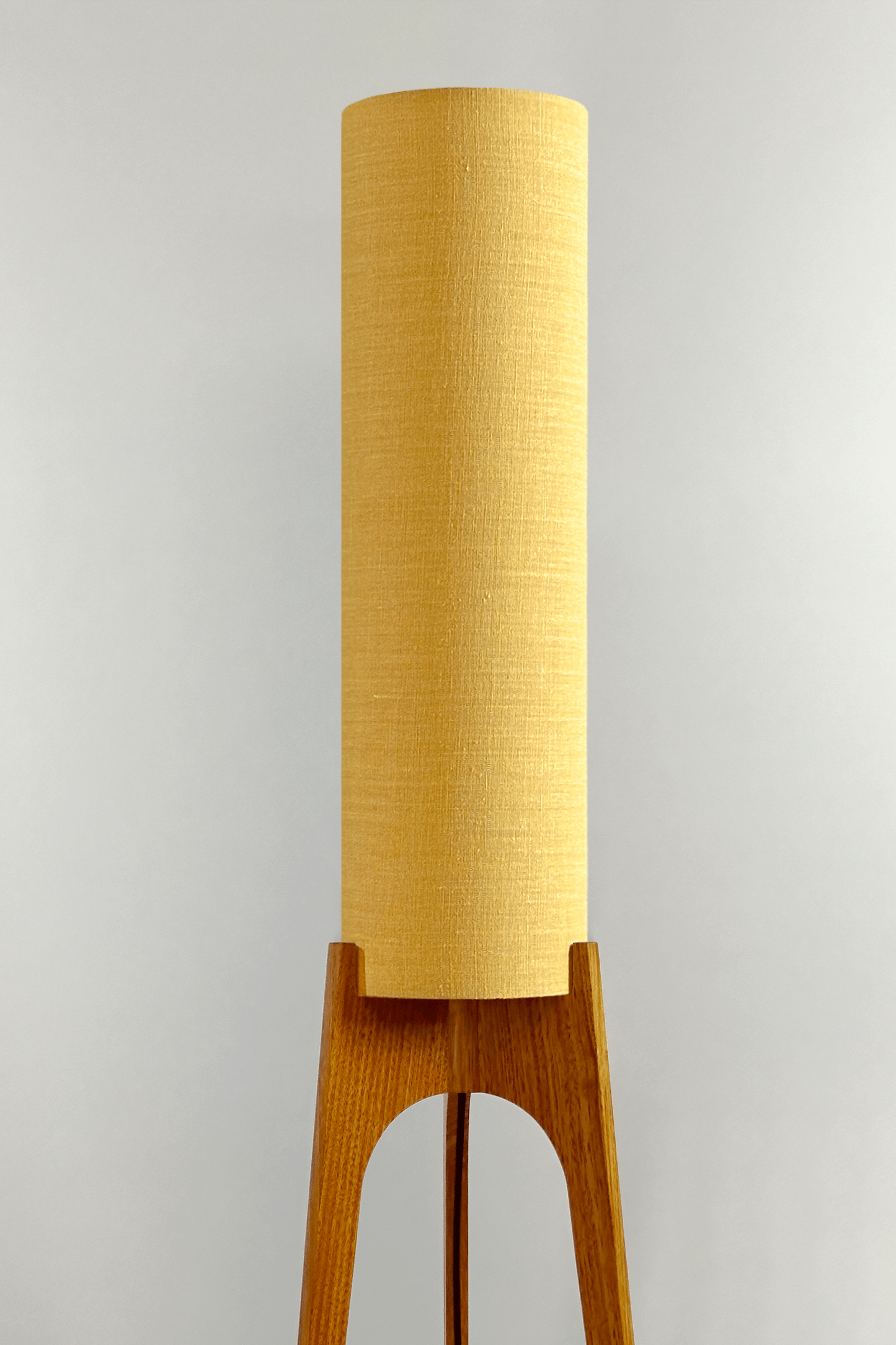 Wooden Rocket floor lamp with a premium linen shade in Wheat 